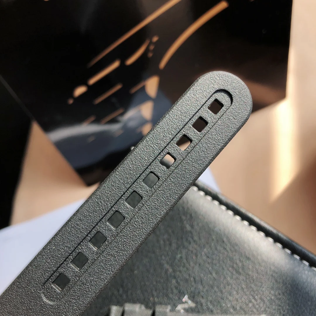 Original buckle, rubber strap — photographed off the sweep