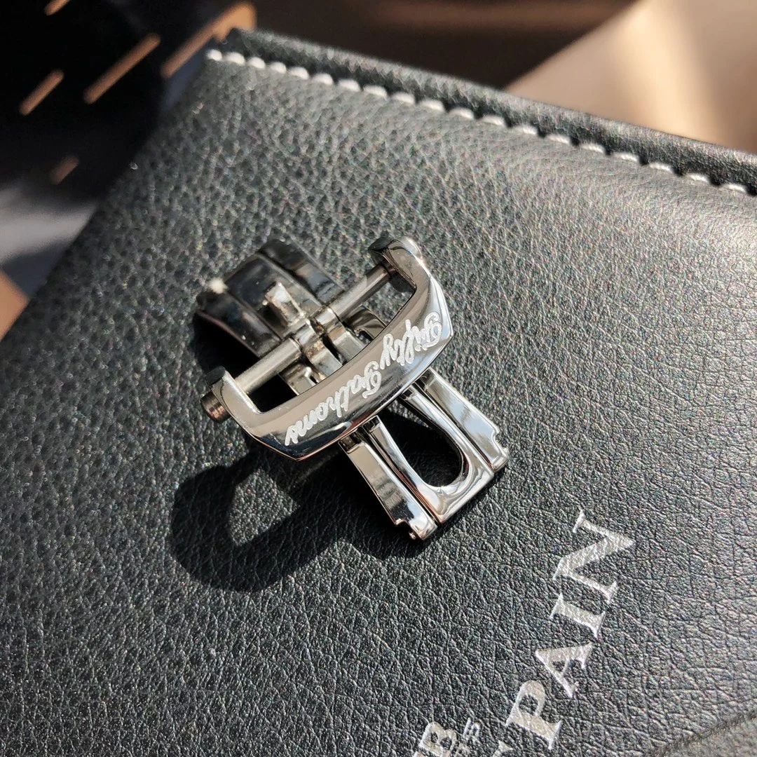 Original buckle, rubber strap — photographed off the sweep
