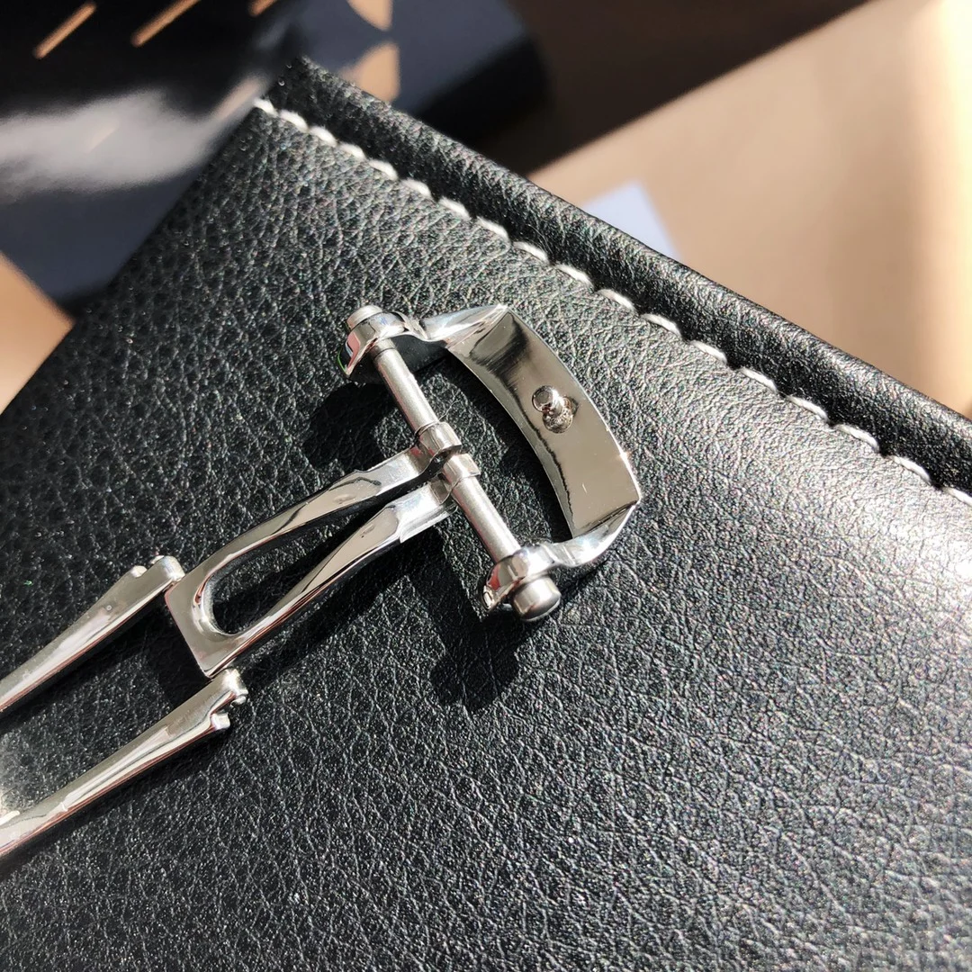 Original buckle, rubber strap — photographed off the sweep