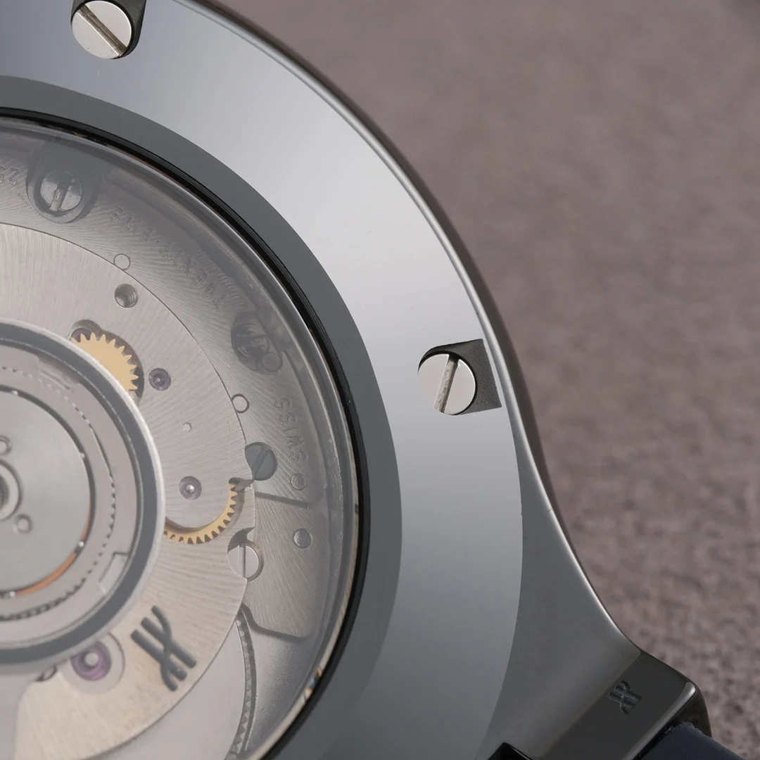 Original exhibition case back movement, identical to the original — photographed off the sweep