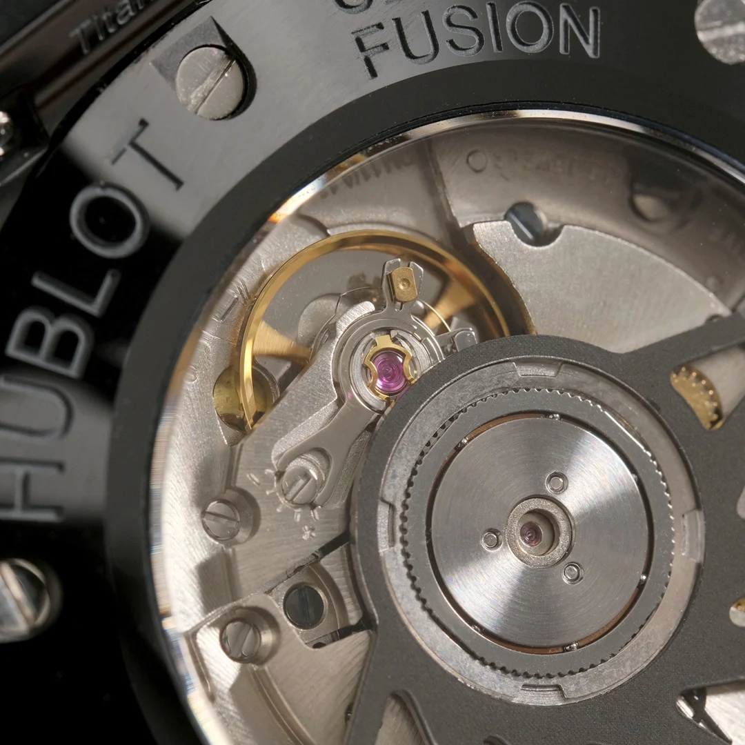 Original exhibition case back movement, identical to the original — photographed off the sweep