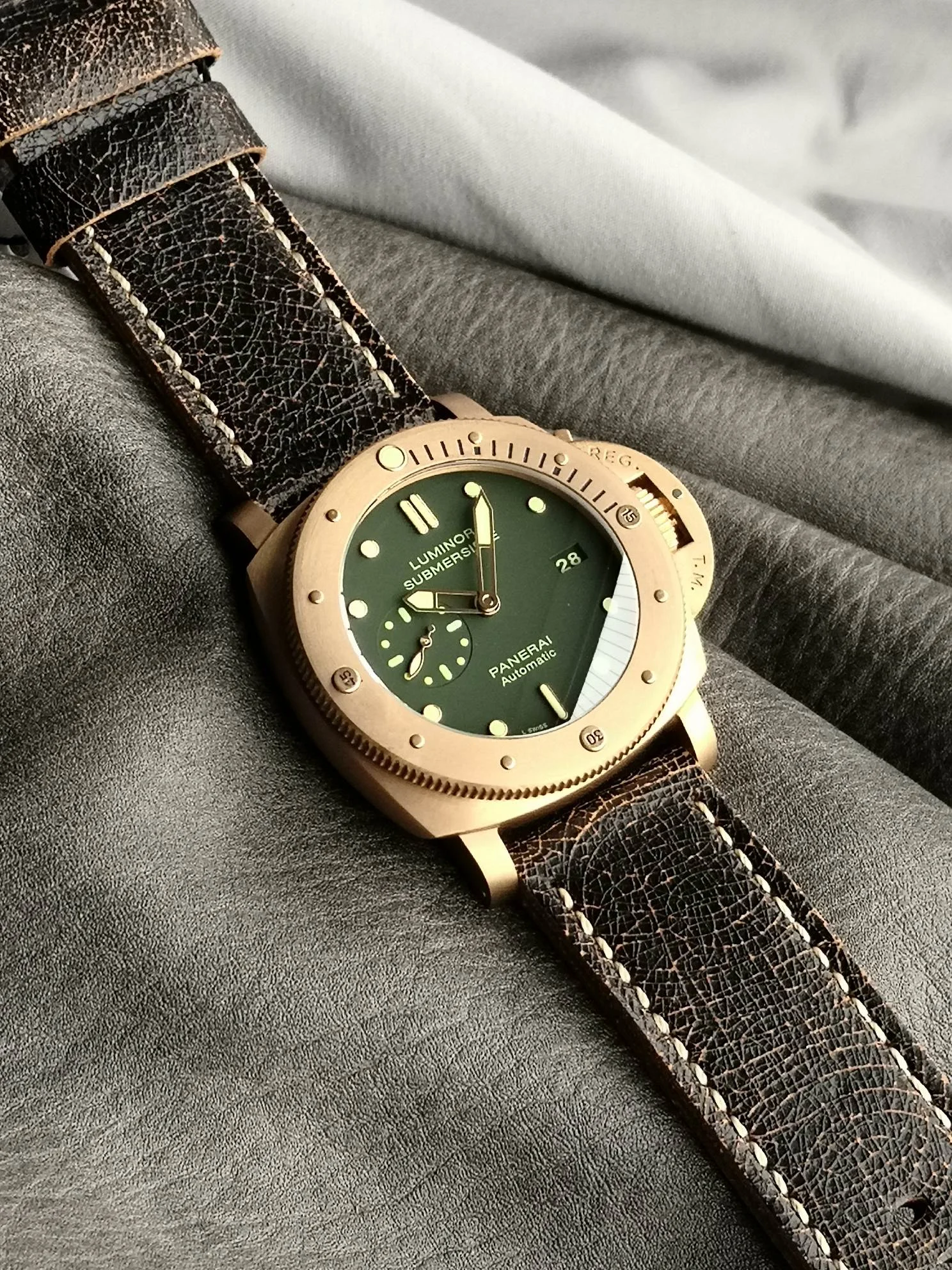 Panerai Bronze Green Dial PAM00382 — photographed off the sweep