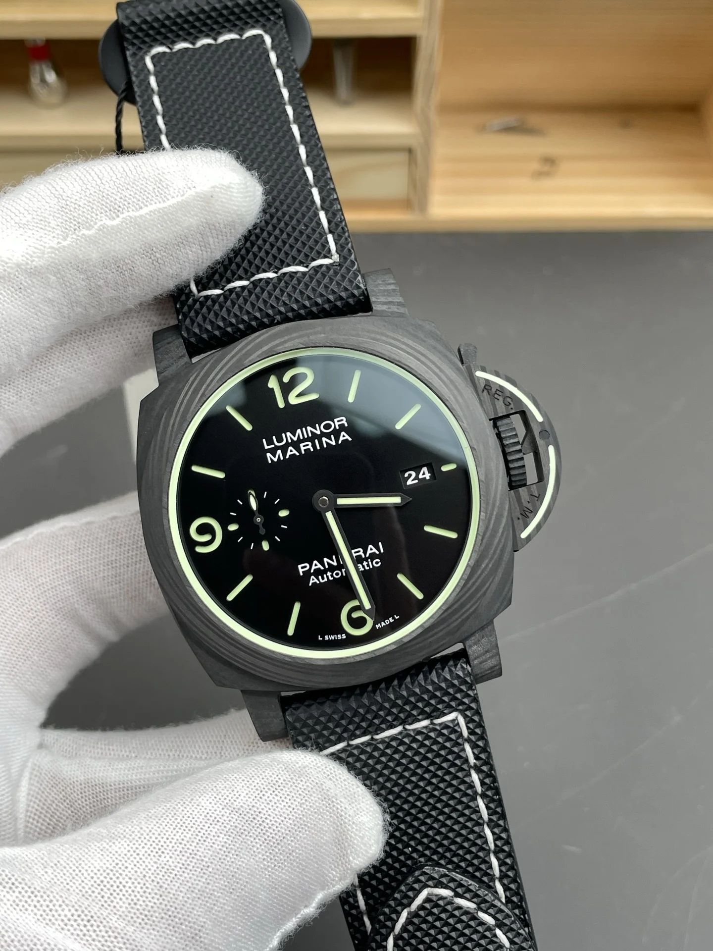 Panerai Carbon PAM01118 44mm — photographed off the sweep