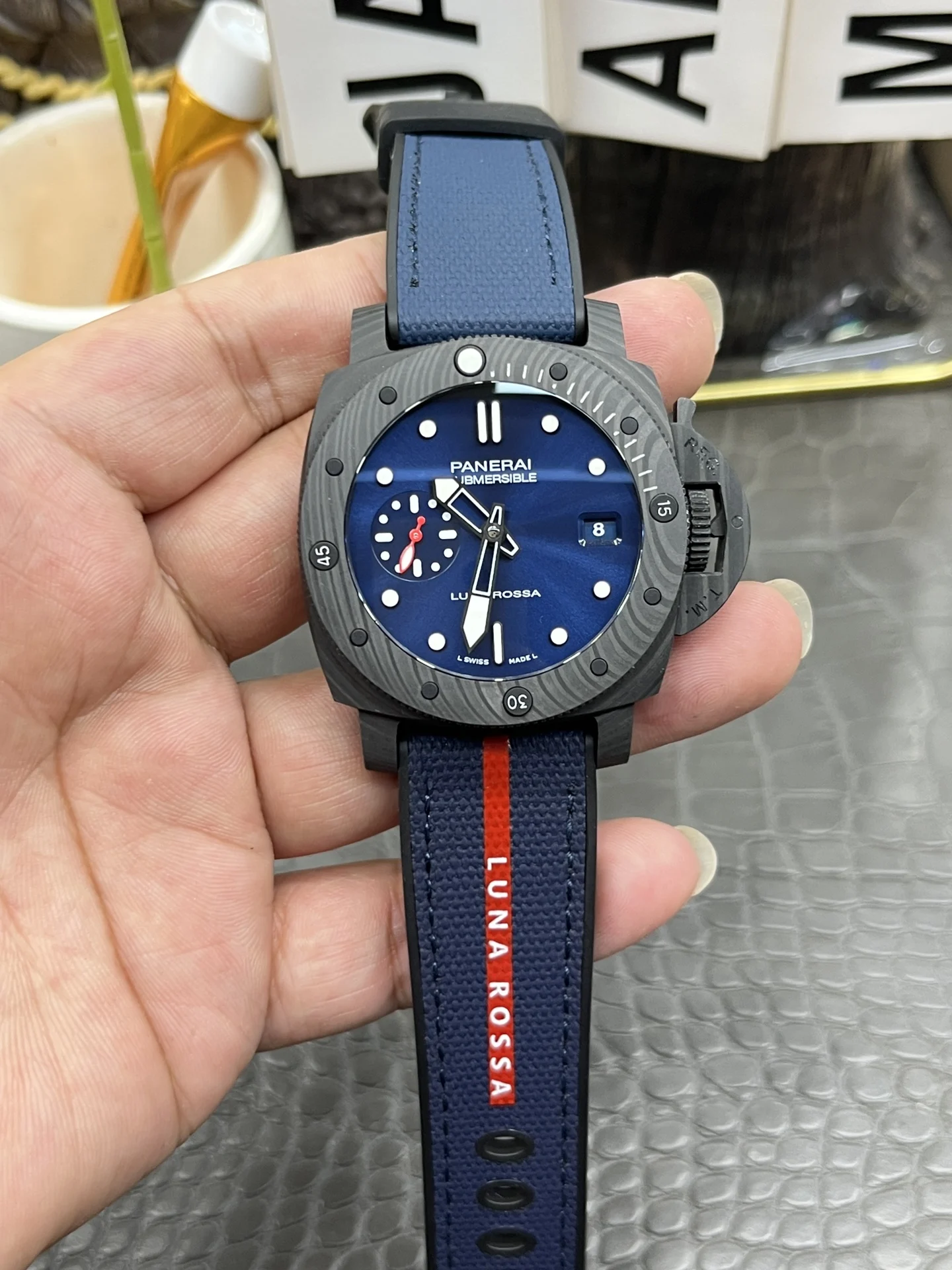 Panerai Carbon PAM01563 — photographed off the sweep
