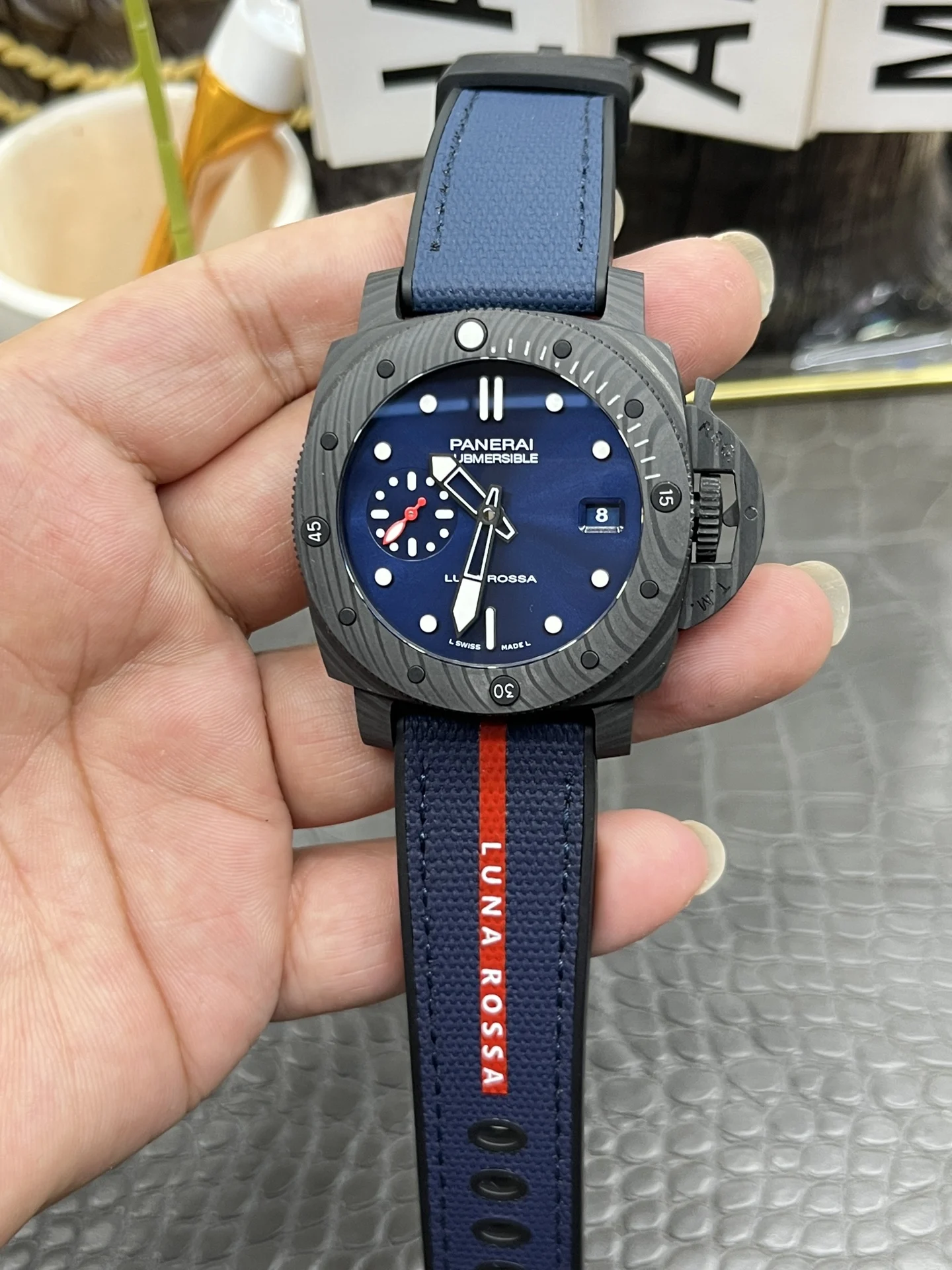 Panerai Carbon PAM01563 — photographed off the sweep