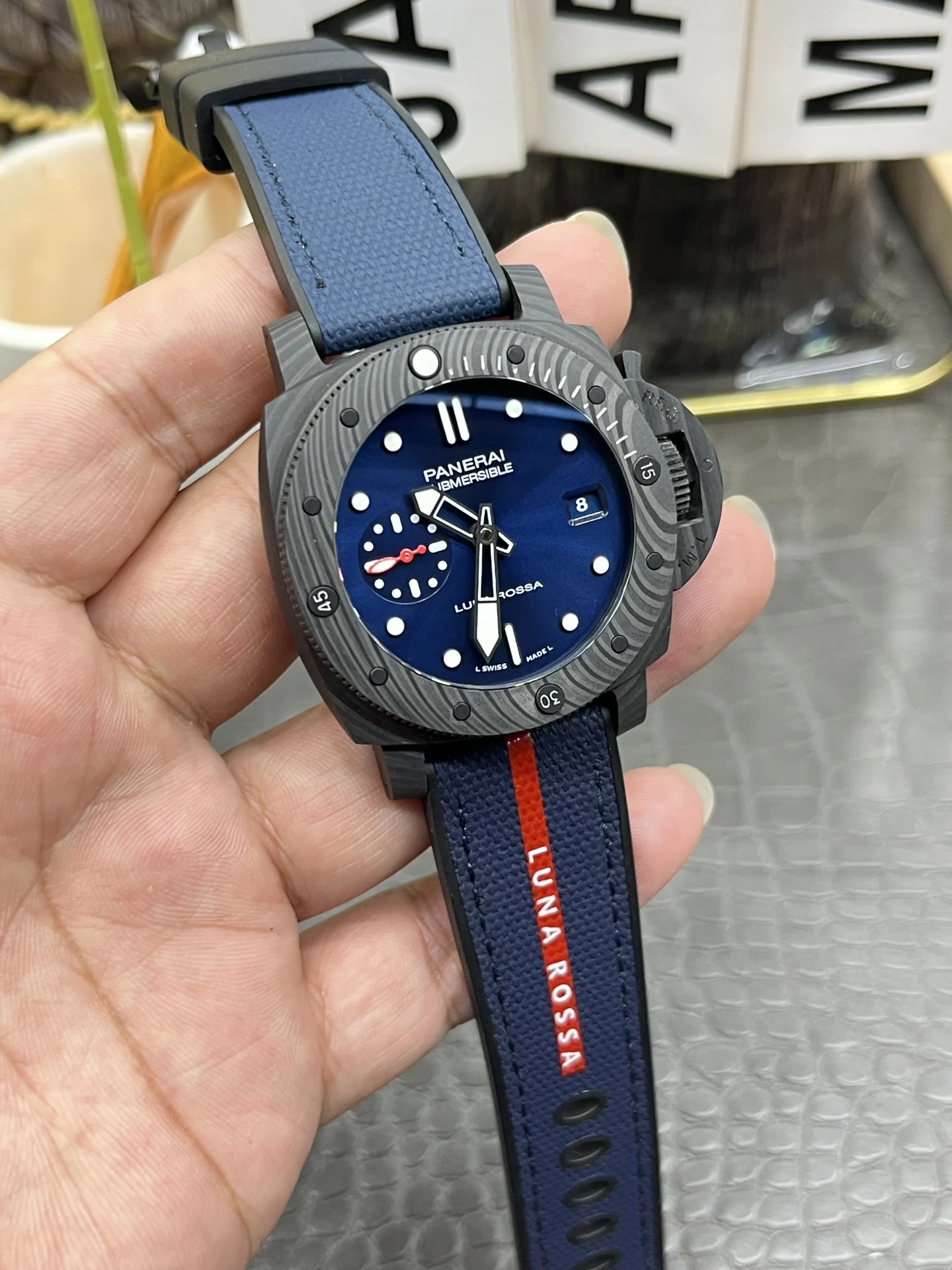 Panerai Carbon PAM01563 — photographed off the sweep