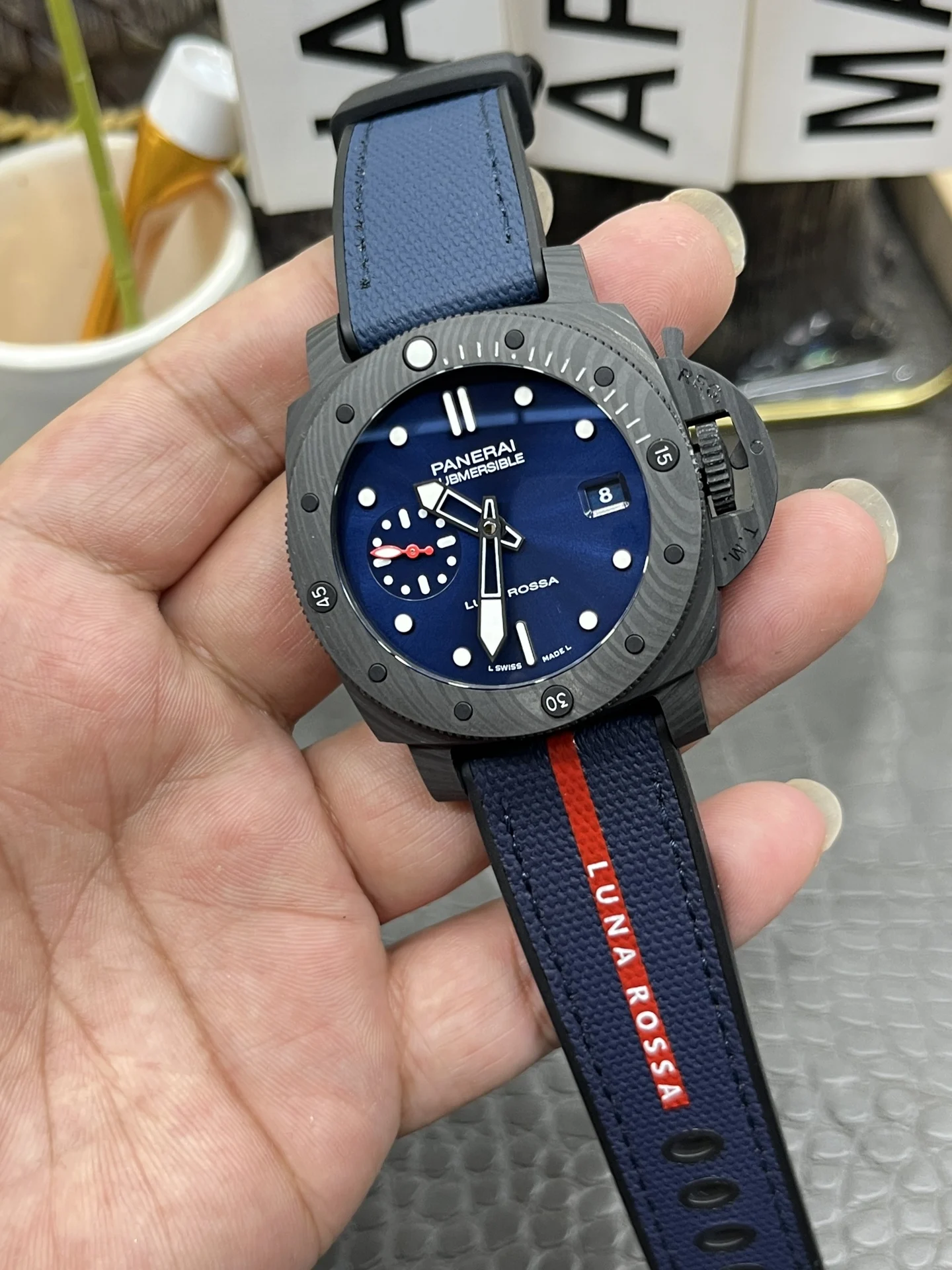 Panerai Carbon PAM01563 — photographed off the sweep