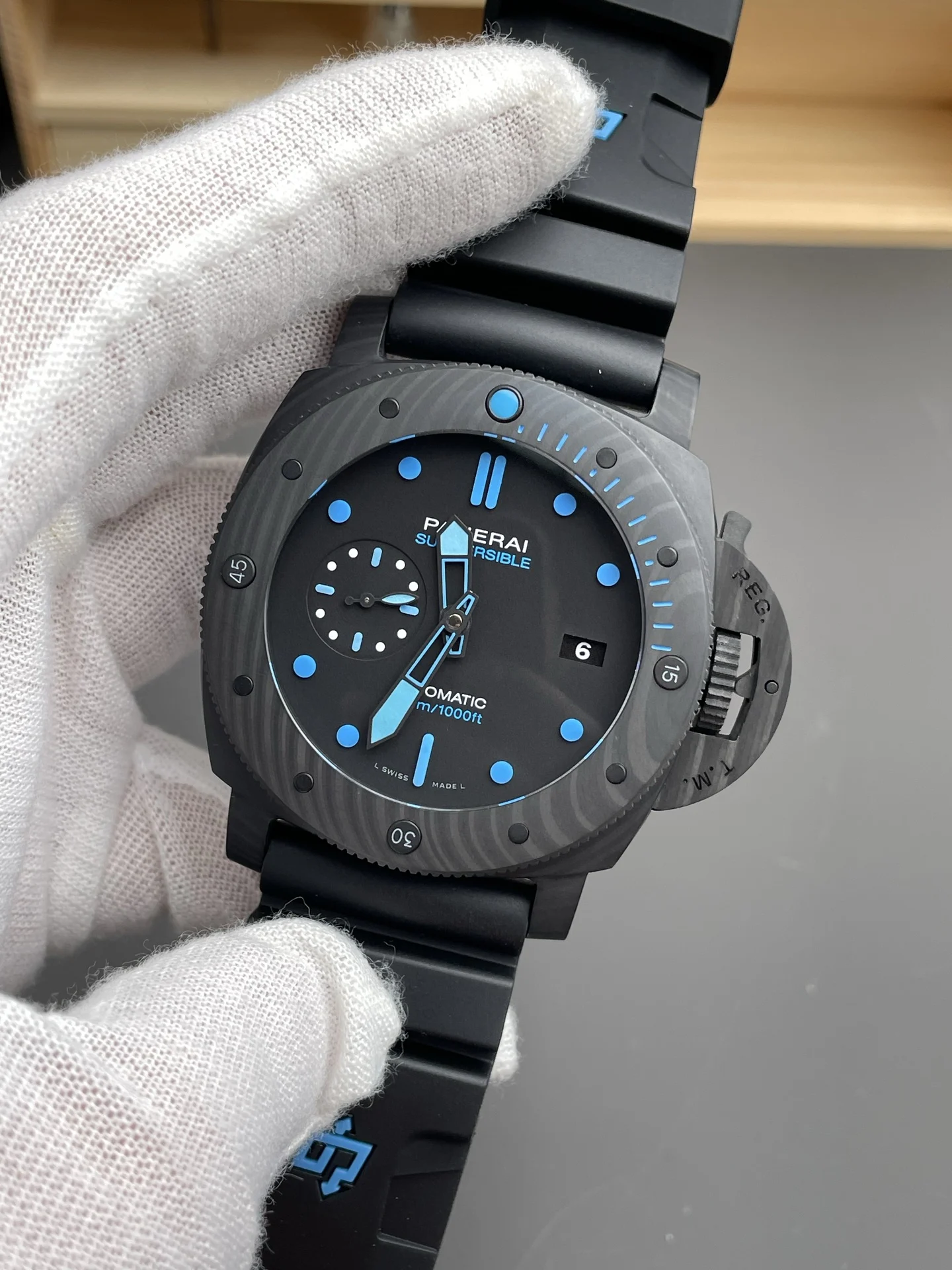 Panerai Carbon PAM01616 47mm — photographed off the sweep