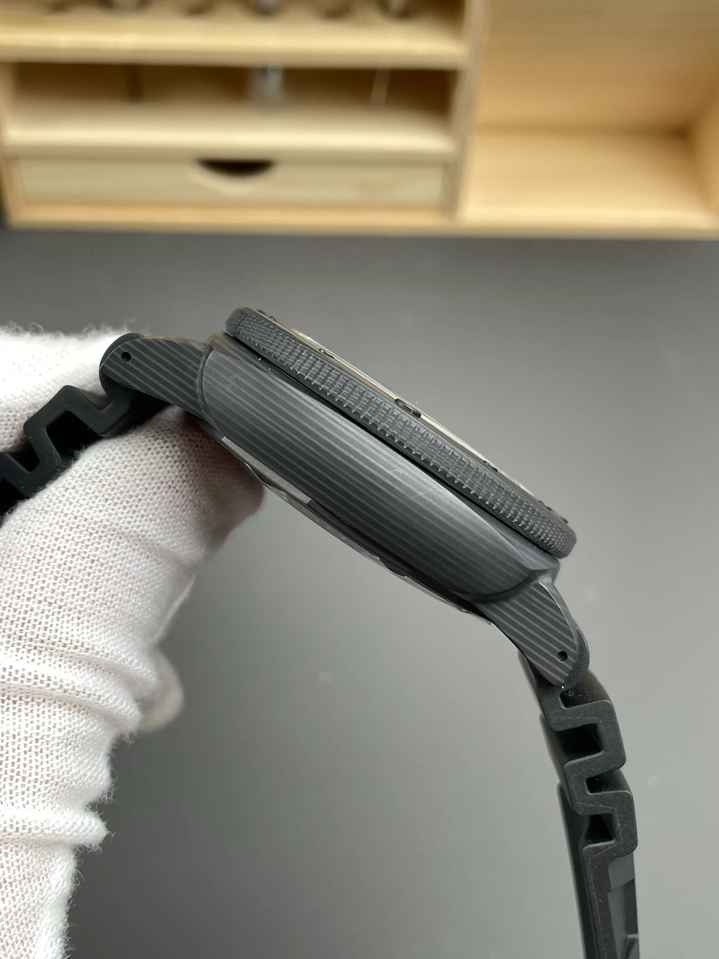 Panerai Carbon PAM01616 47mm — photographed off the sweep