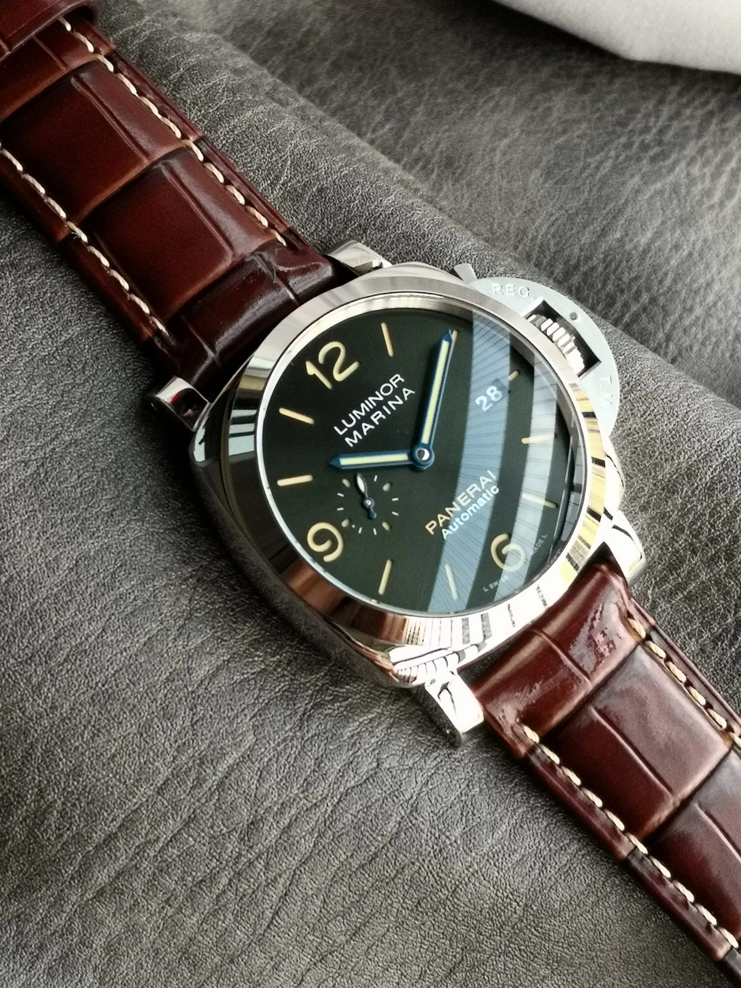 Panerai Steel Green Dial PAM01116 — photographed off the sweep
