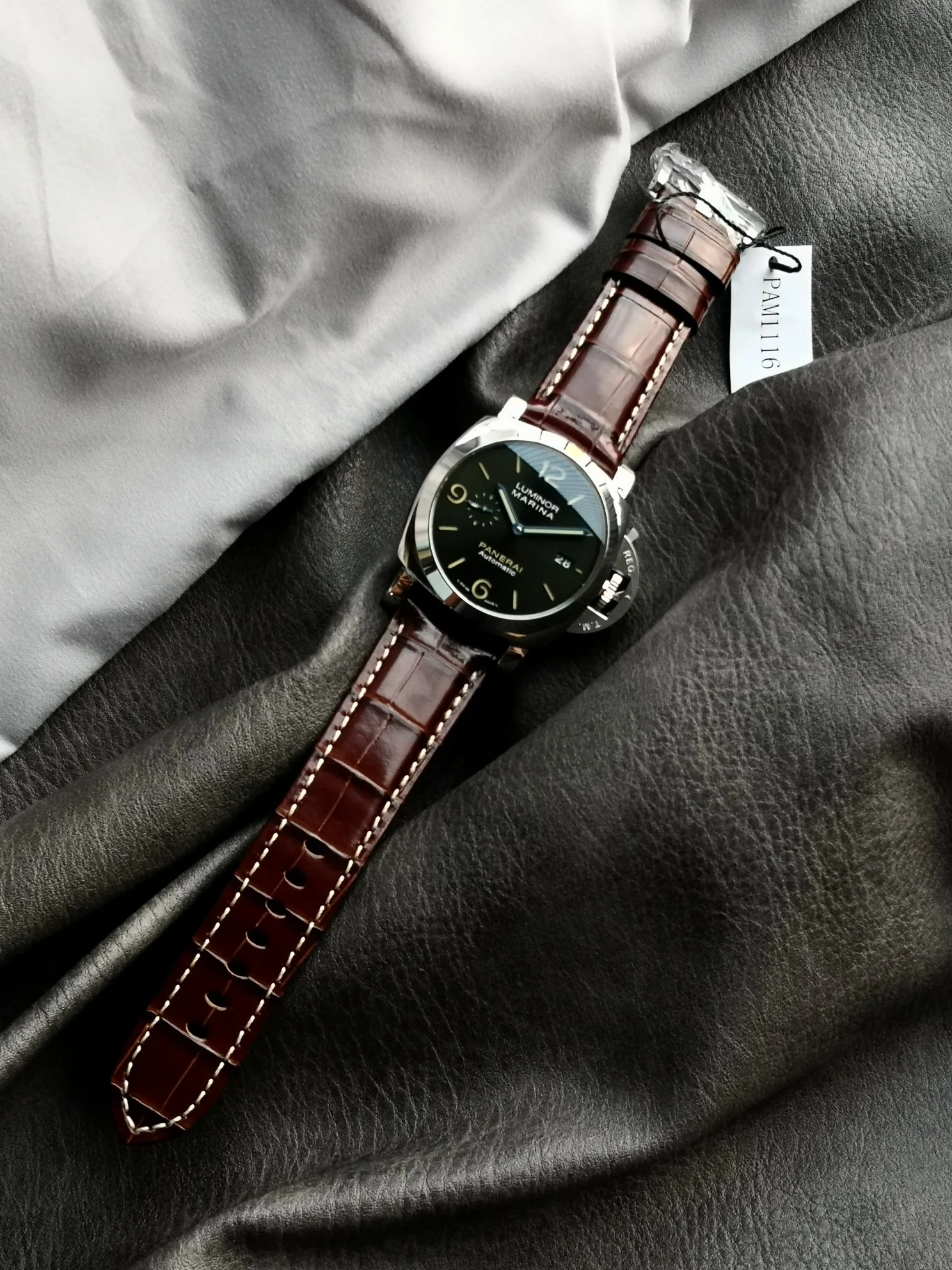 Panerai Steel Green Dial PAM01116 — photographed off the sweep