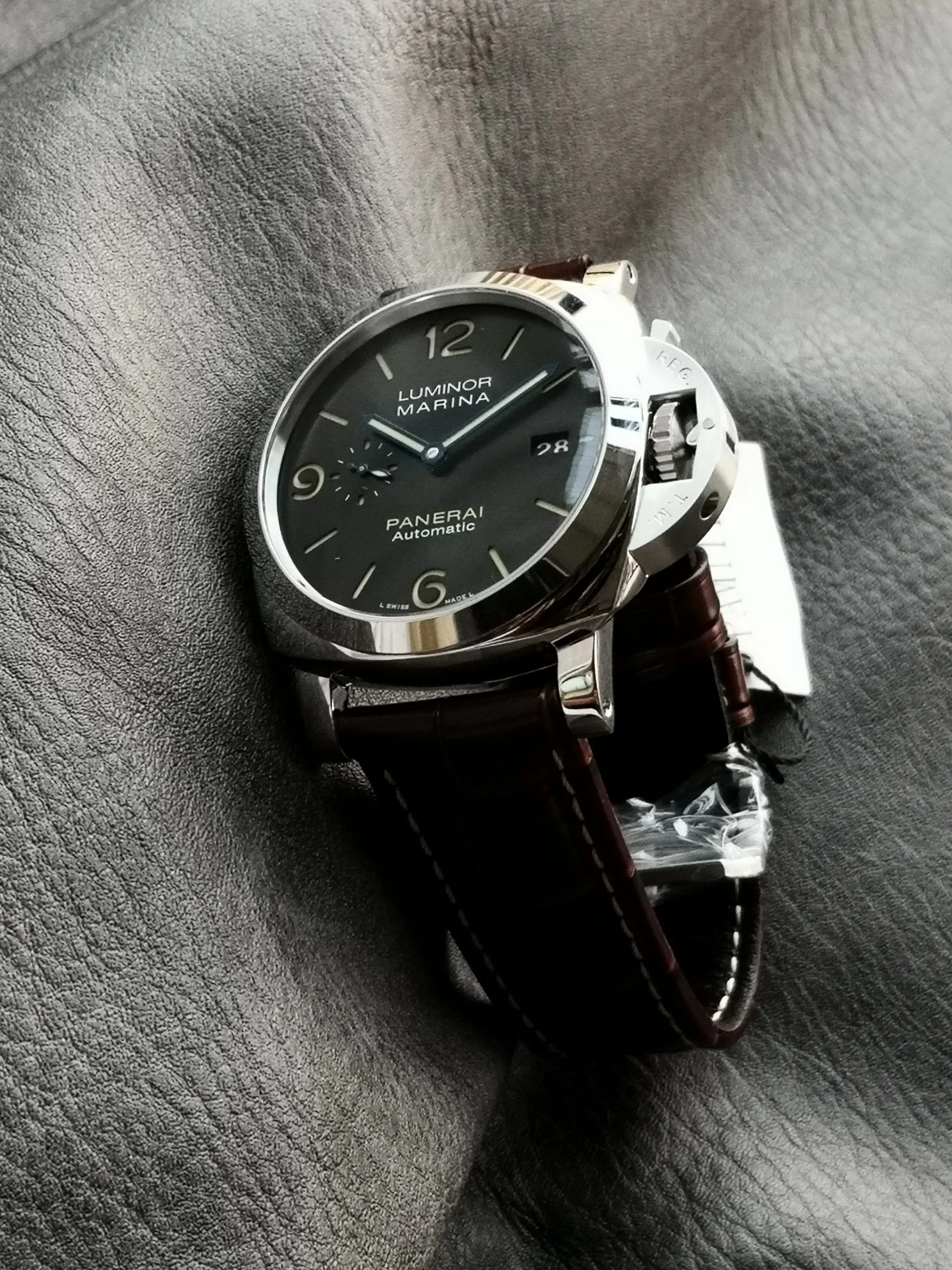 Panerai Steel Green Dial PAM01116 — photographed off the sweep
