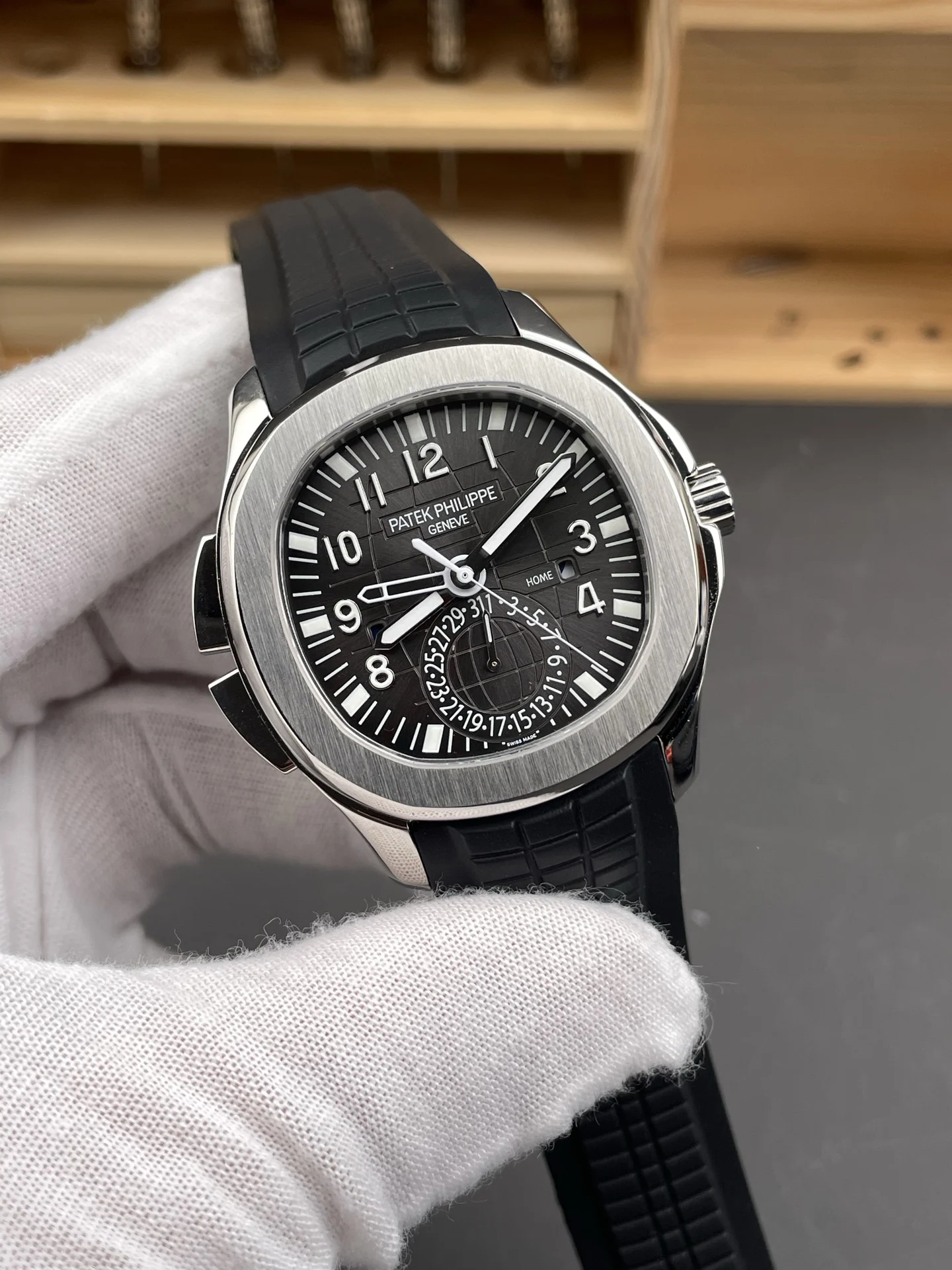 Patek Philippe Aquanaut Black Dial 5164 — photographed off the sweep