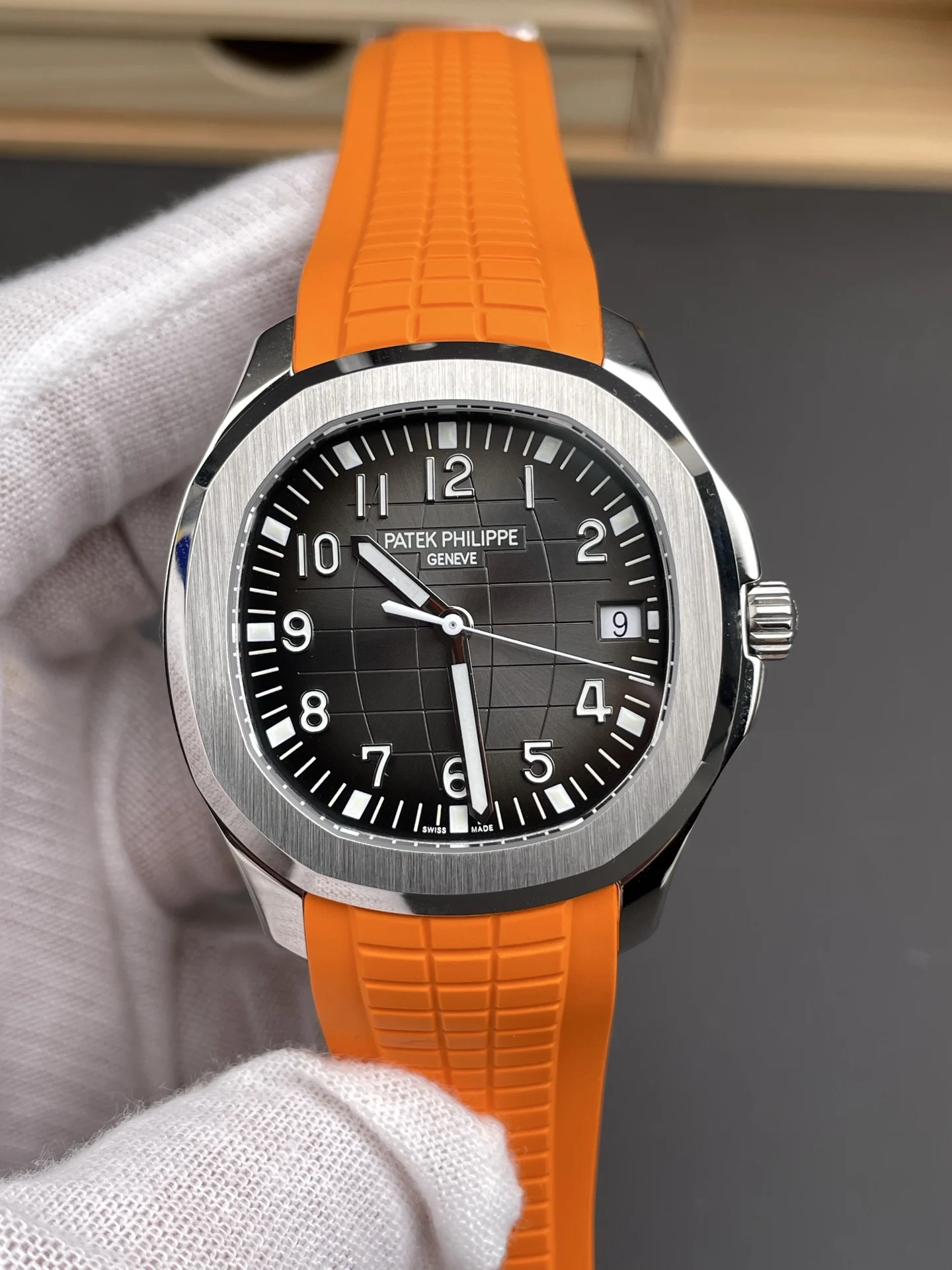 Patek Philippe Aquanaut Orange Dial 5167A — photographed off the sweep