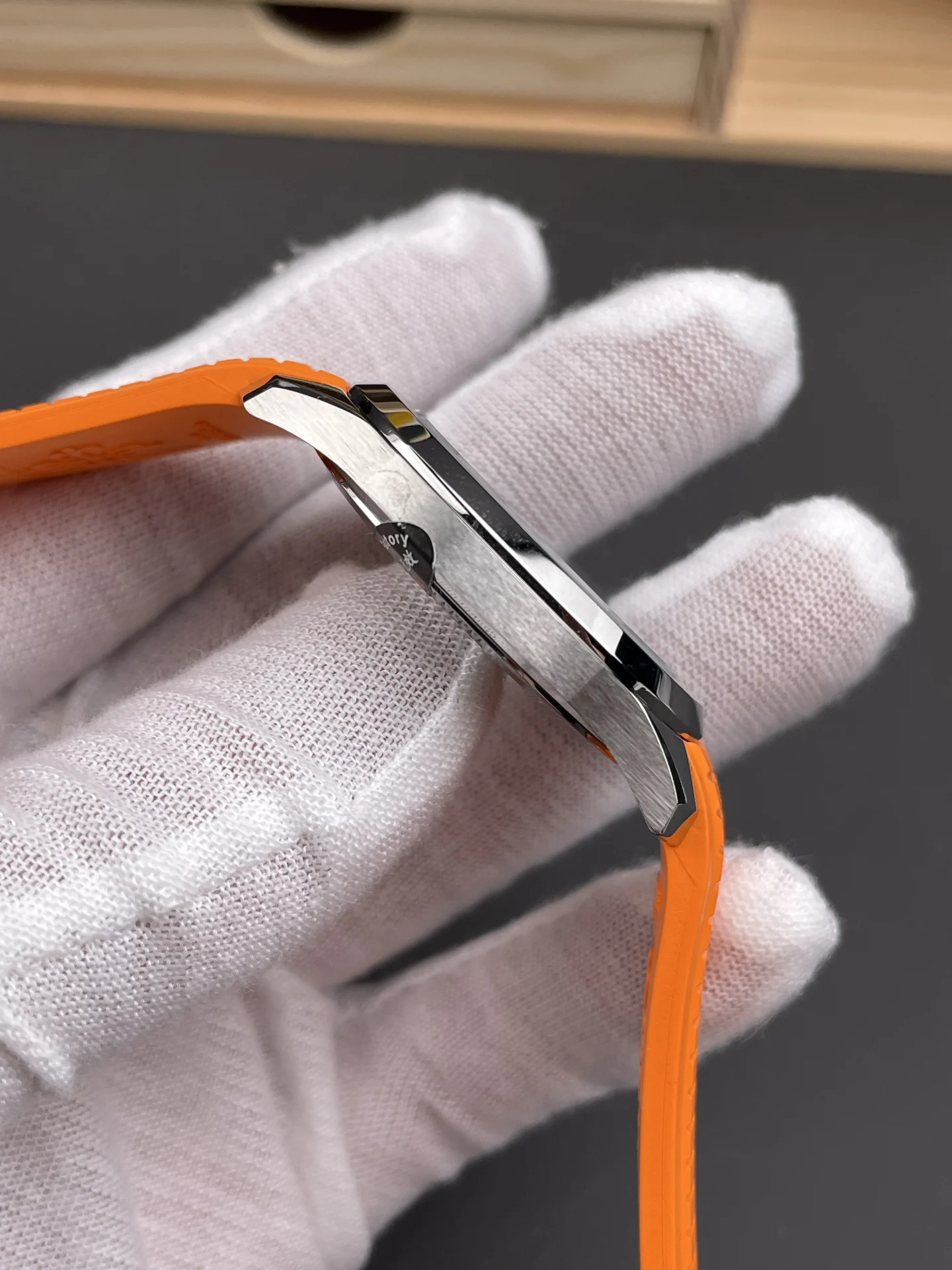 Patek Philippe Aquanaut Orange Dial 5167A — photographed off the sweep