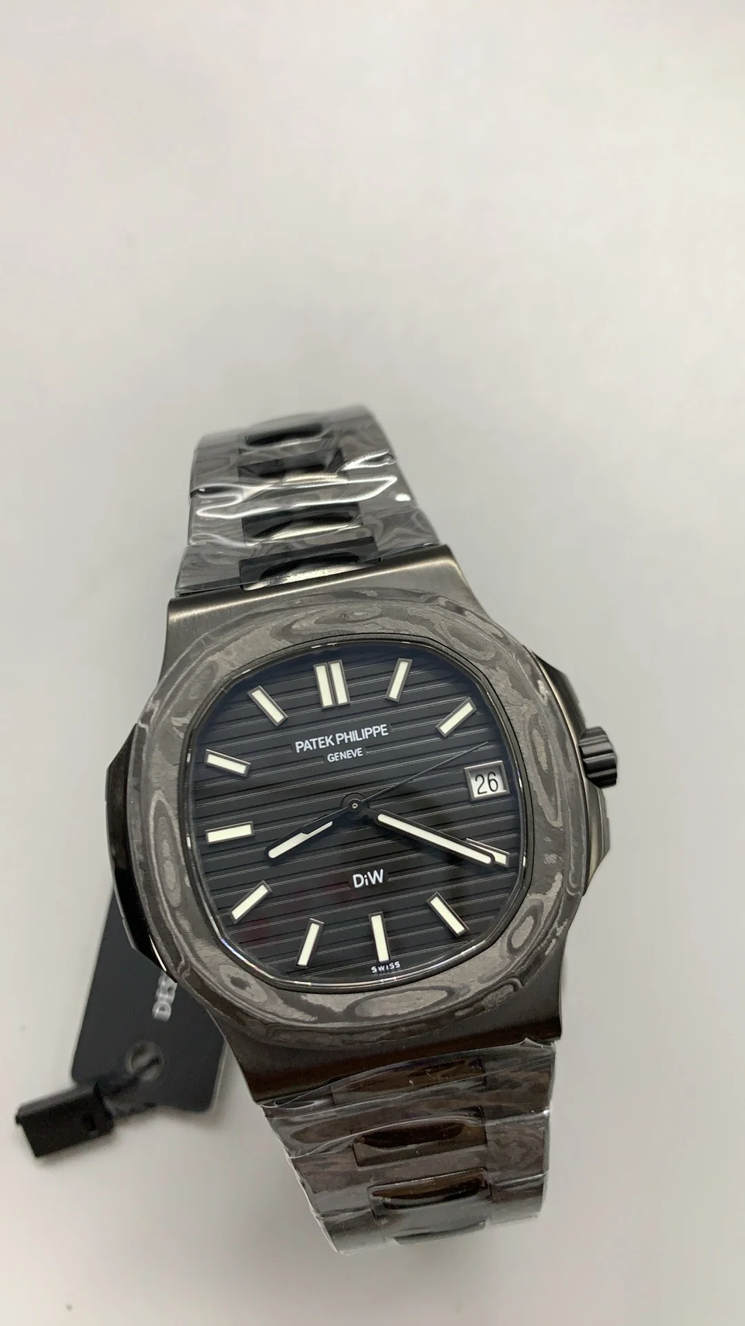 Patek Philippe Carbon 5711 — photographed off the sweep