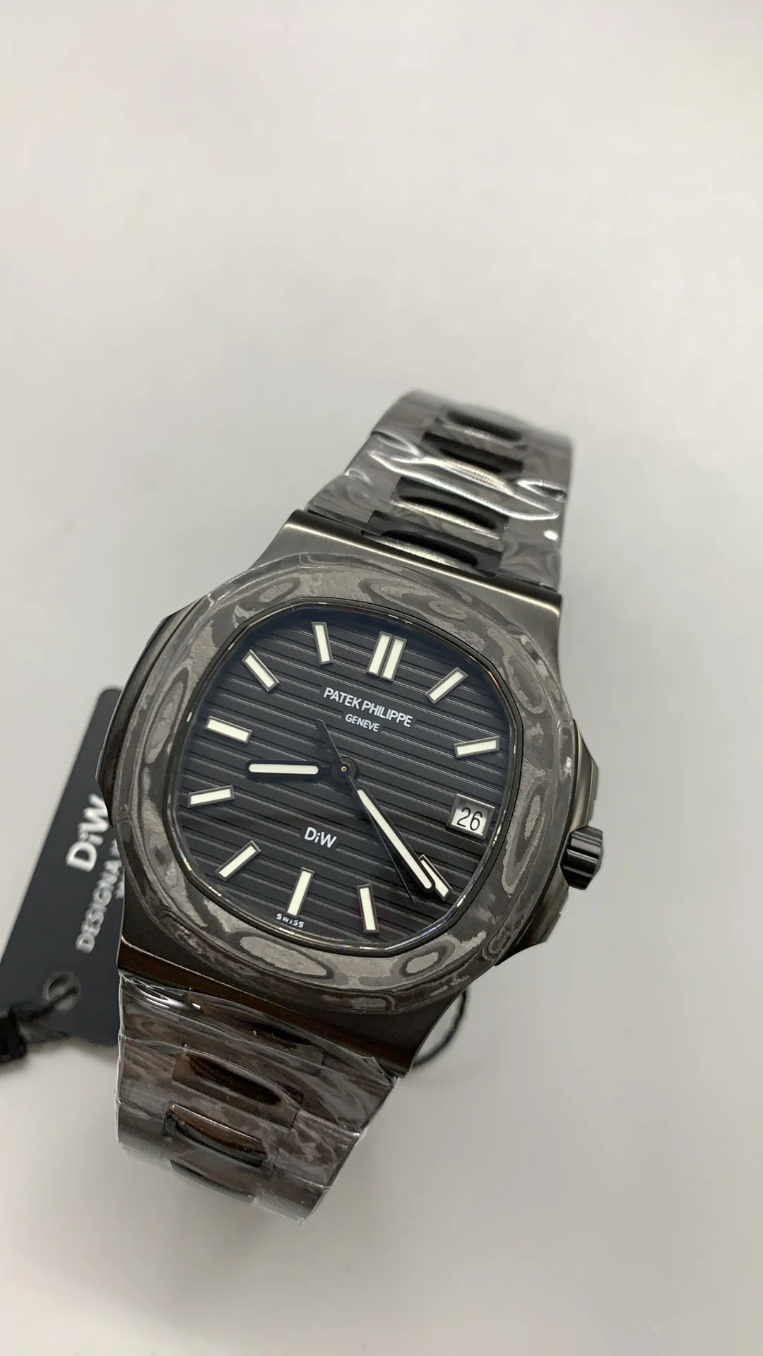 Patek Philippe Carbon 5711 — photographed off the sweep