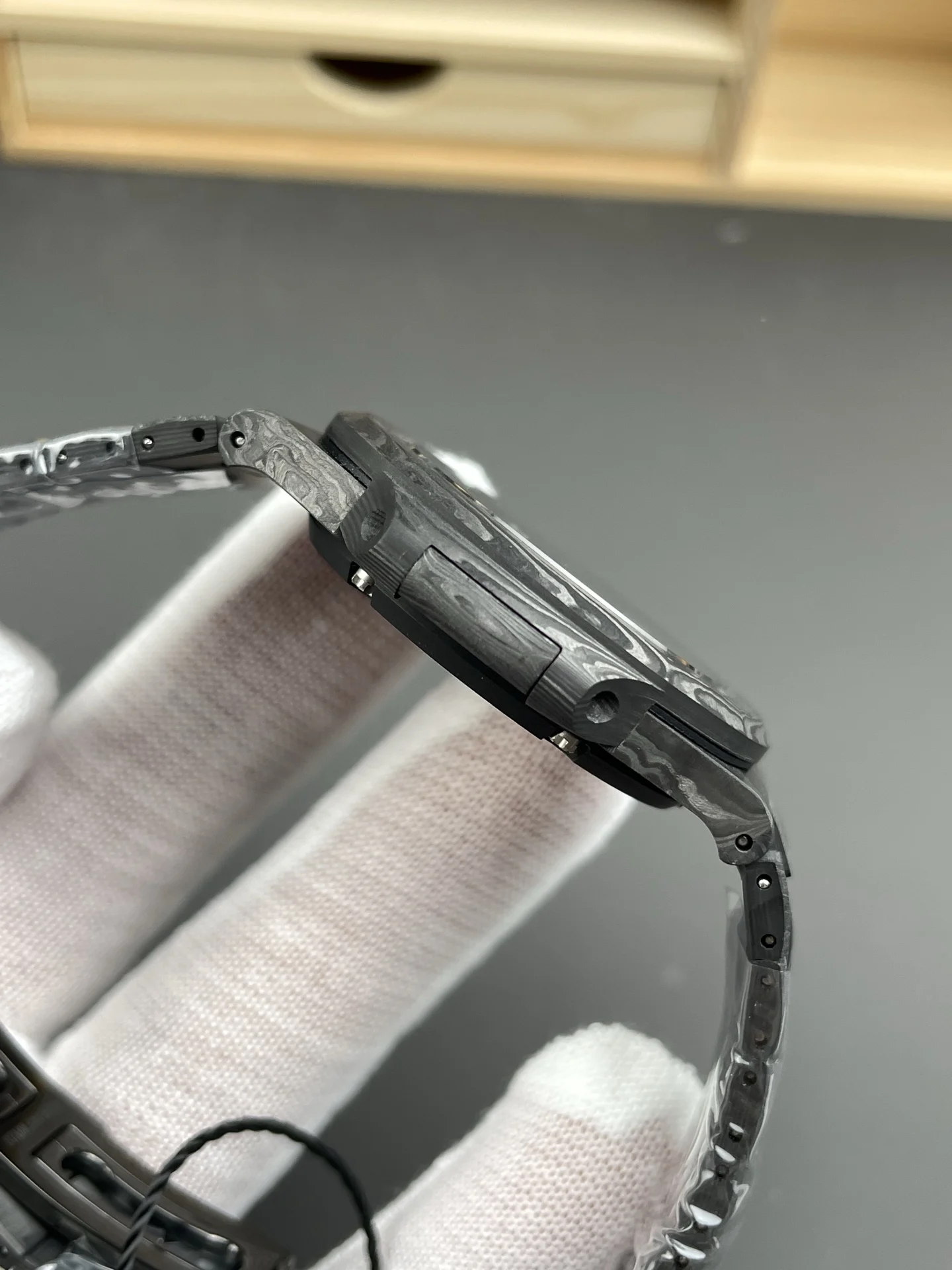 Patek Philippe Nautilus Carbon 5711 — photographed off the sweep