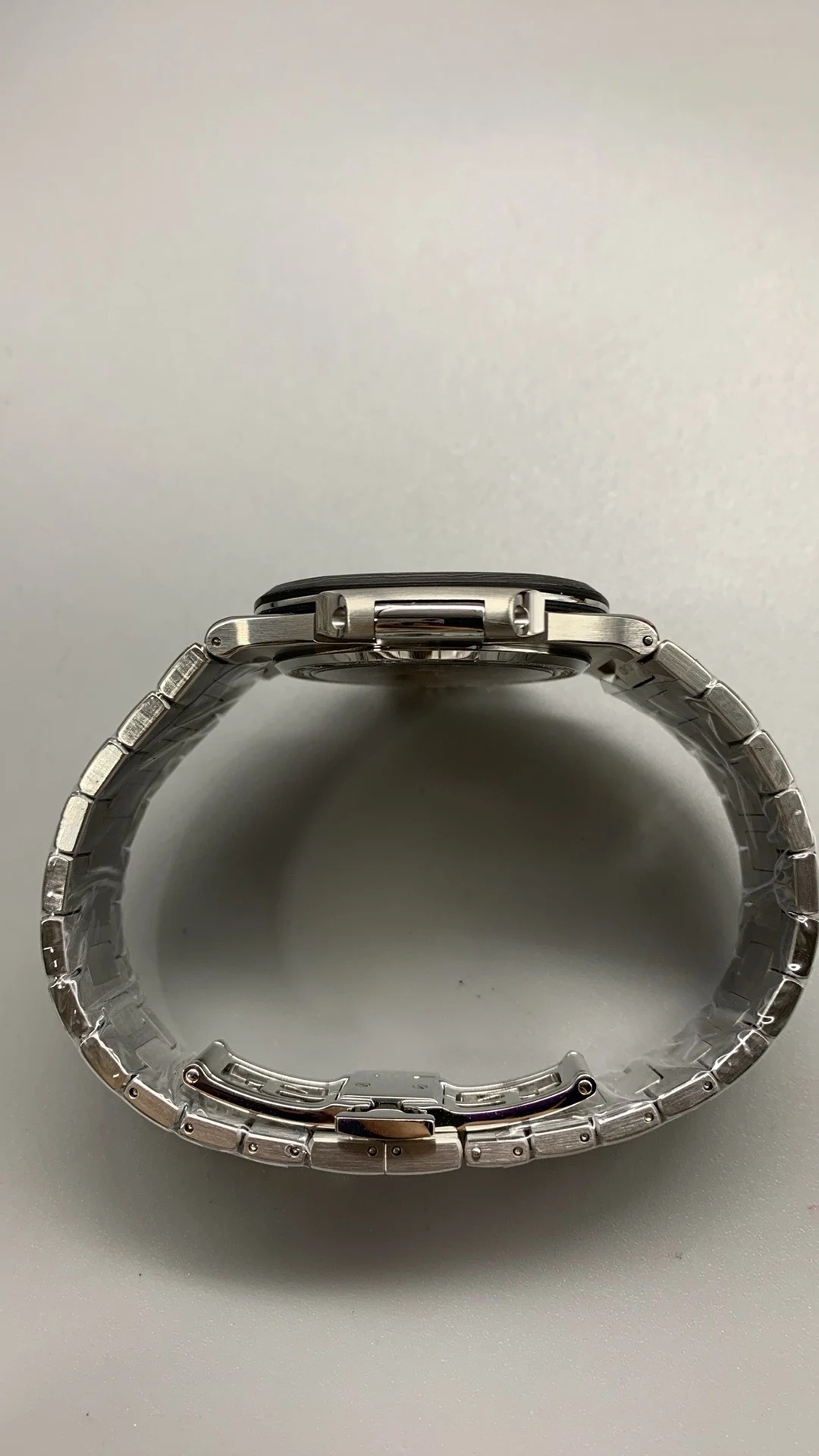 Patek Philippe Nautilus Carbon — photographed off the sweep