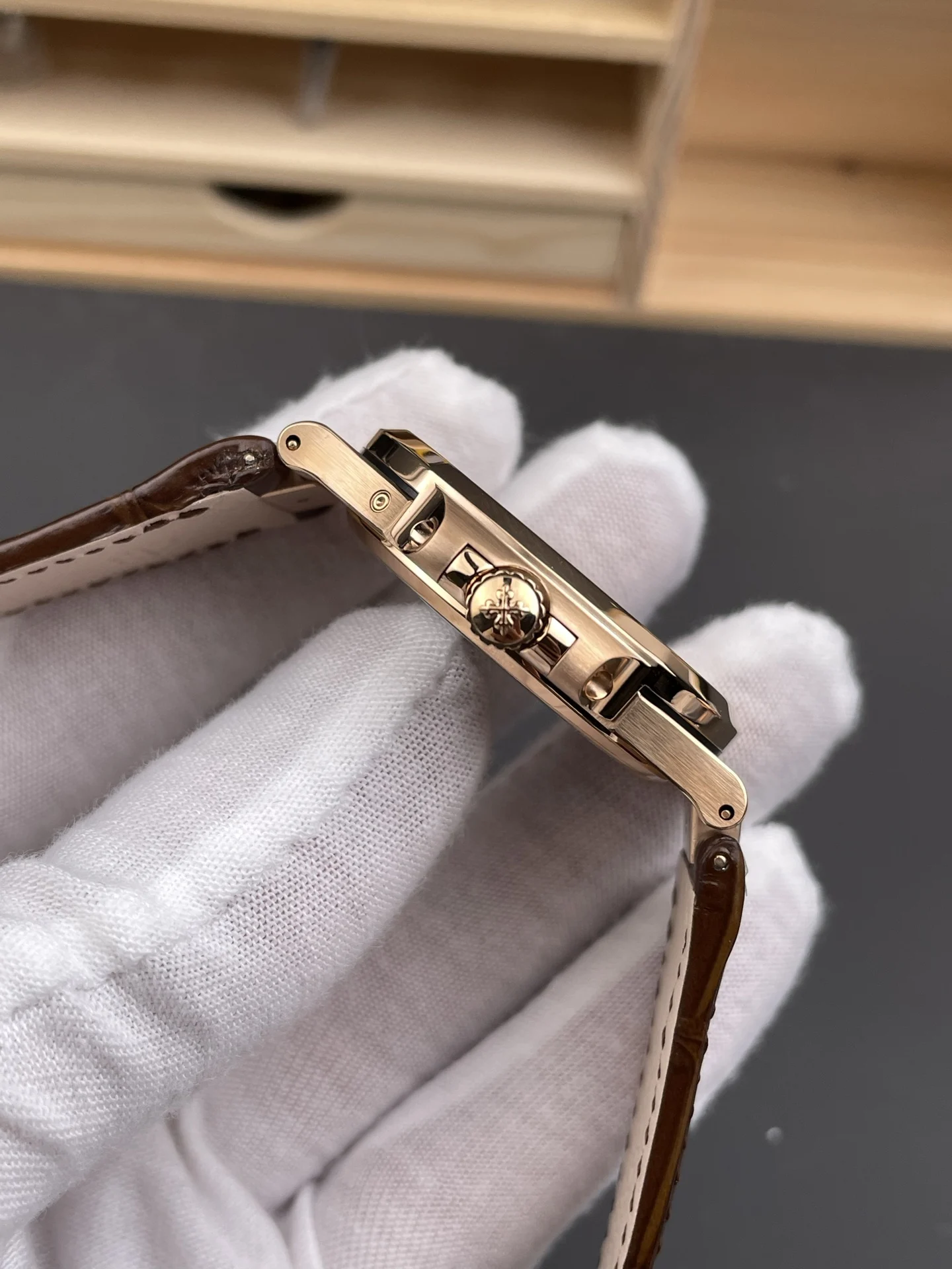 Patek Philippe Nautilus Rose Gold Black Dial 5712 40mm — photographed off the sweep