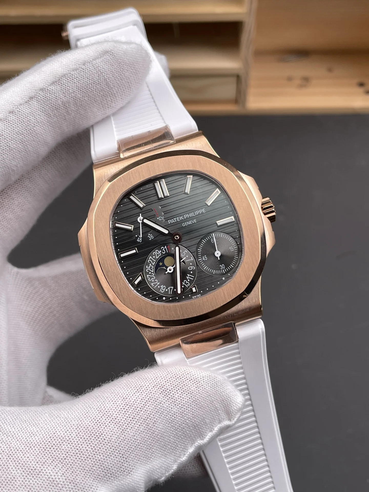 Patek Philippe Nautilus Rose Gold Black Dial 5712 40mm — photographed off the sweep