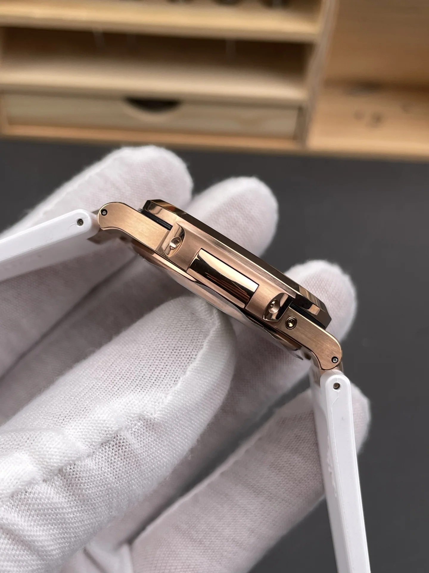 Patek Philippe Nautilus Rose Gold Black Dial 5712 40mm — photographed off the sweep