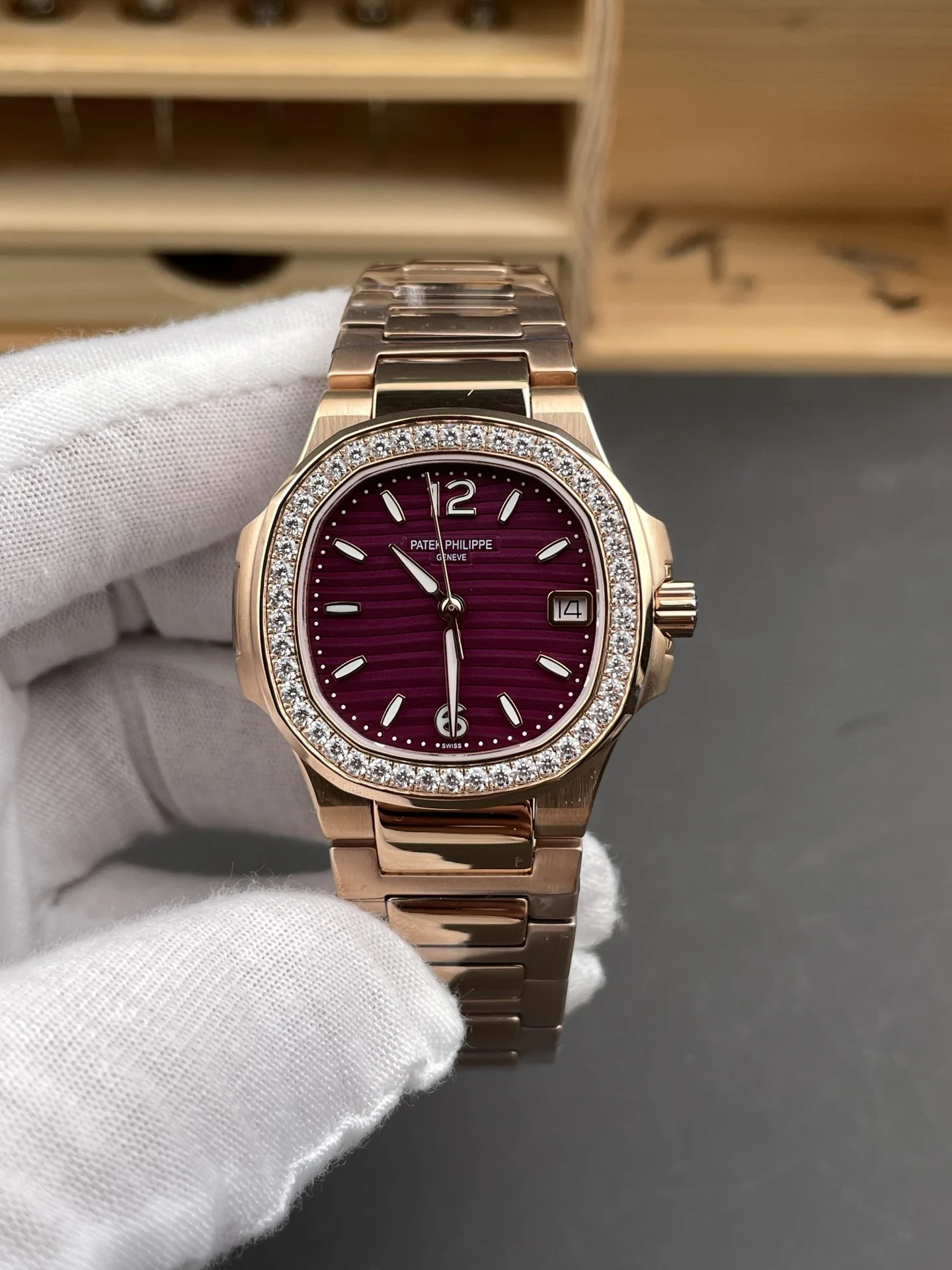 Patek Philippe Nautilus Rose Gold Purple Dial 7010 — photographed off the sweep