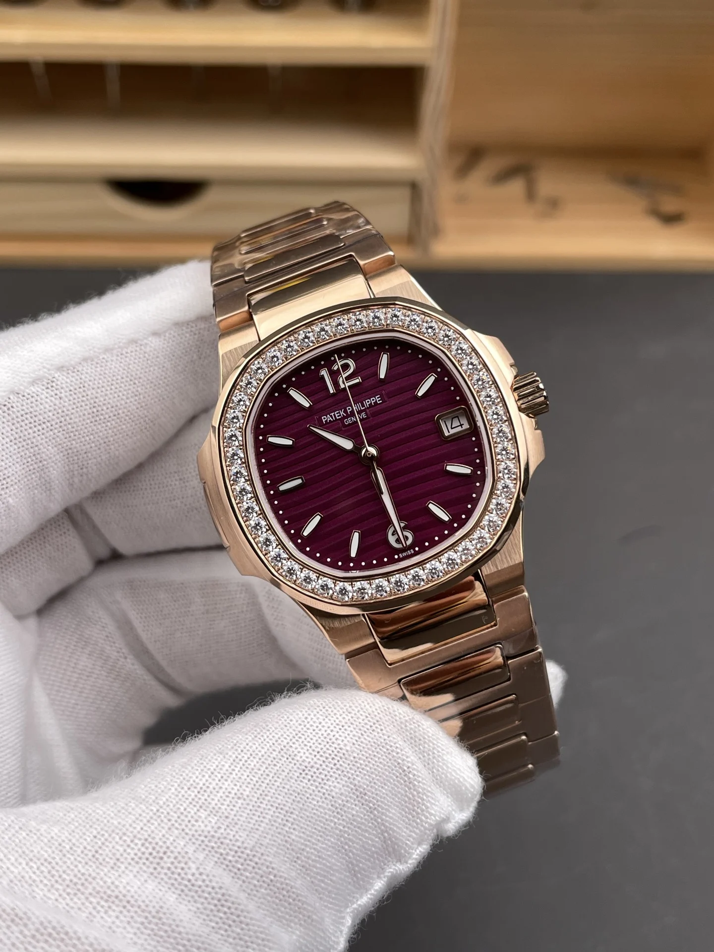 Patek Philippe Nautilus Rose Gold Purple Dial 7010 — photographed off the sweep