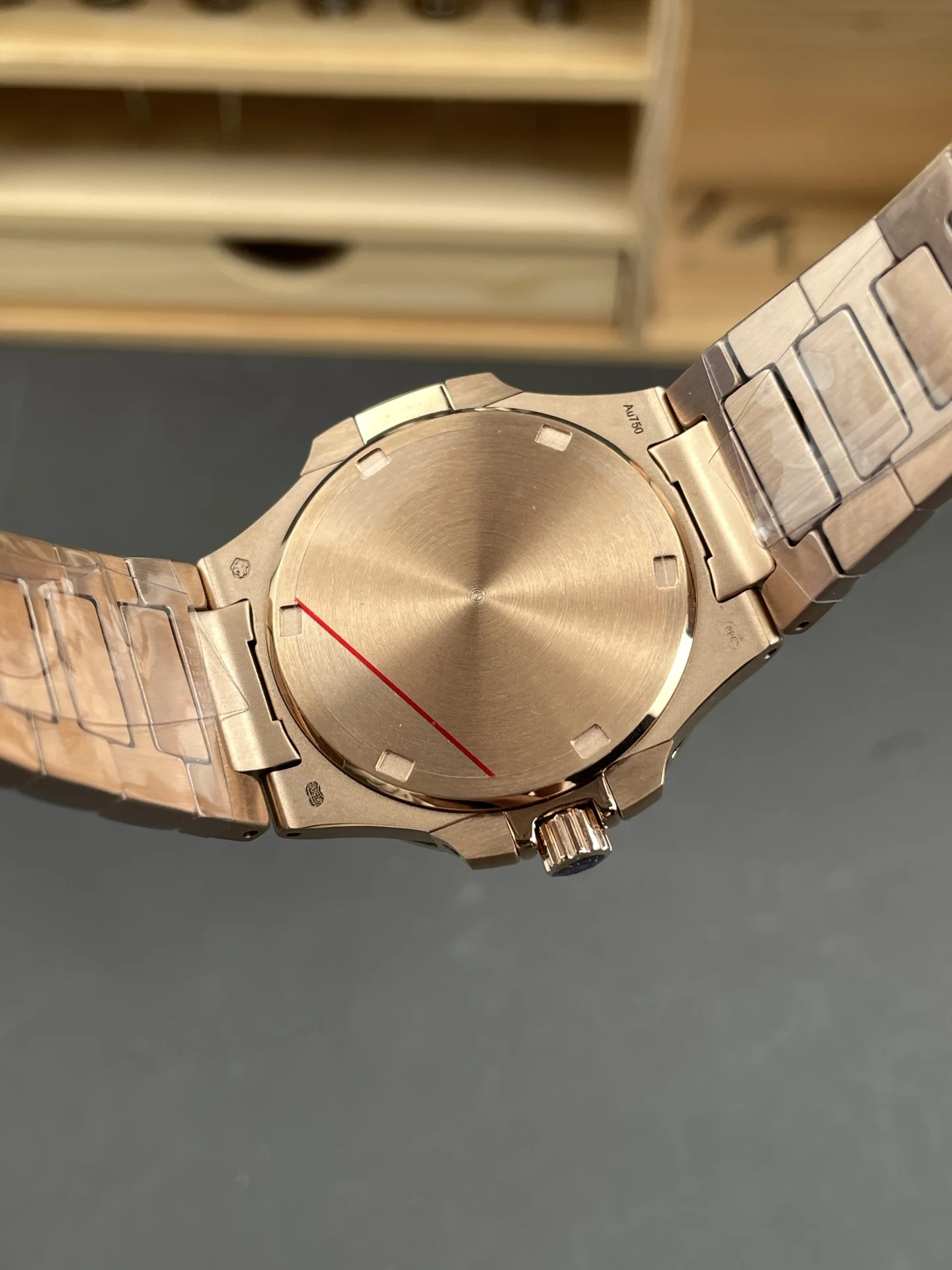 Patek Philippe Nautilus Rose Gold Purple Dial 7010 — photographed off the sweep