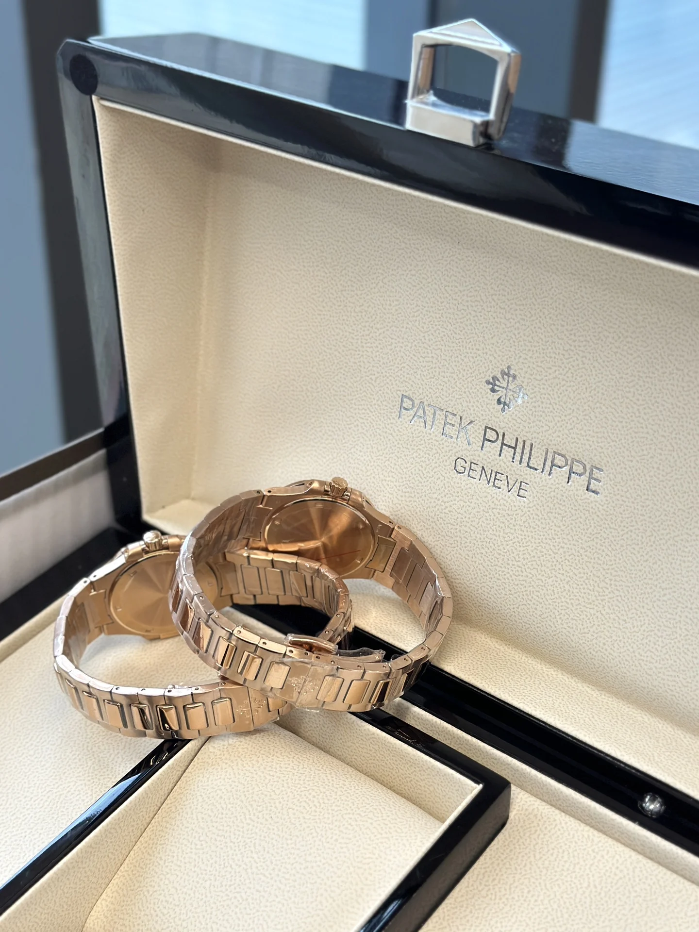 Patek Philippe Nautilus Rose Gold White Dial 7010 — photographed off the sweep
