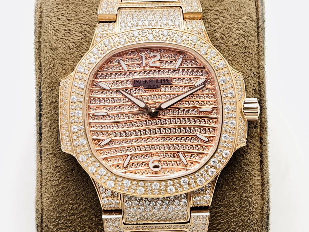 Patek Philippe Nautilus Rose Gold White Dial Diamond-Set 7118 35.2mm — photographed off the sweep