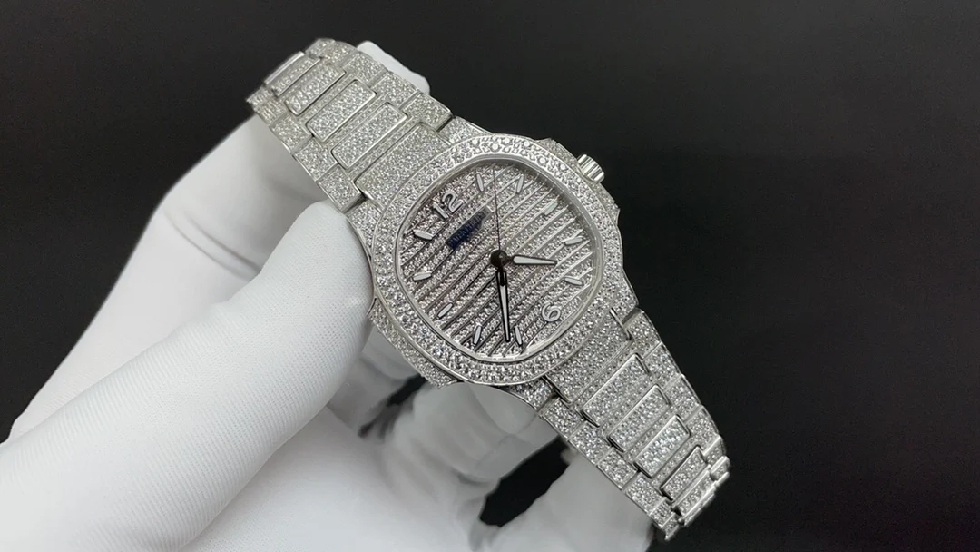 Patek Philippe Nautilus Rose Gold White Dial Diamond-Set 7118 35.2mm — photographed off the sweep