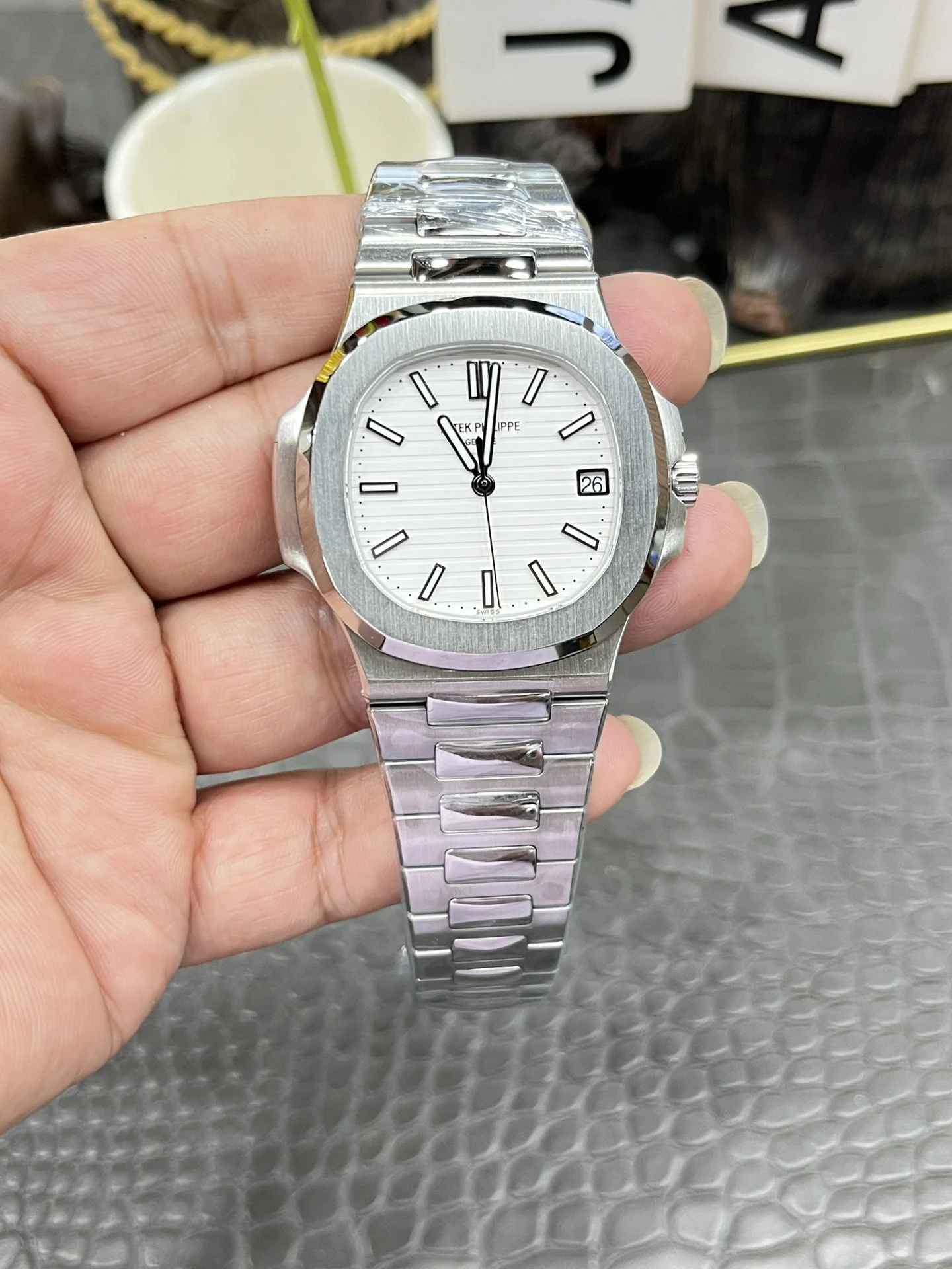 Patek Philippe Nautilus White Dial 5711 40mm — photographed off the sweep