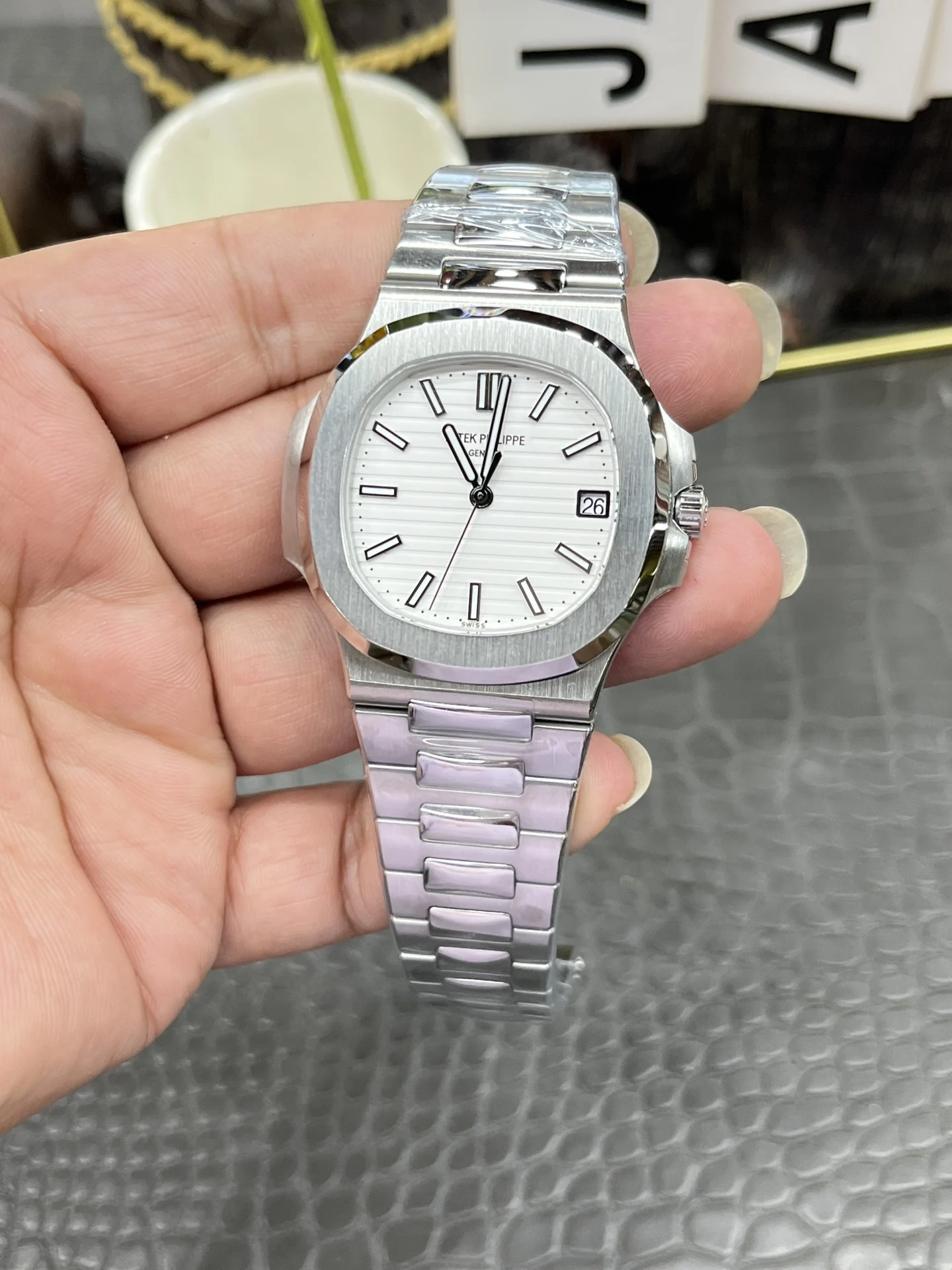 Patek Philippe Nautilus White Dial 5711 40mm — photographed off the sweep