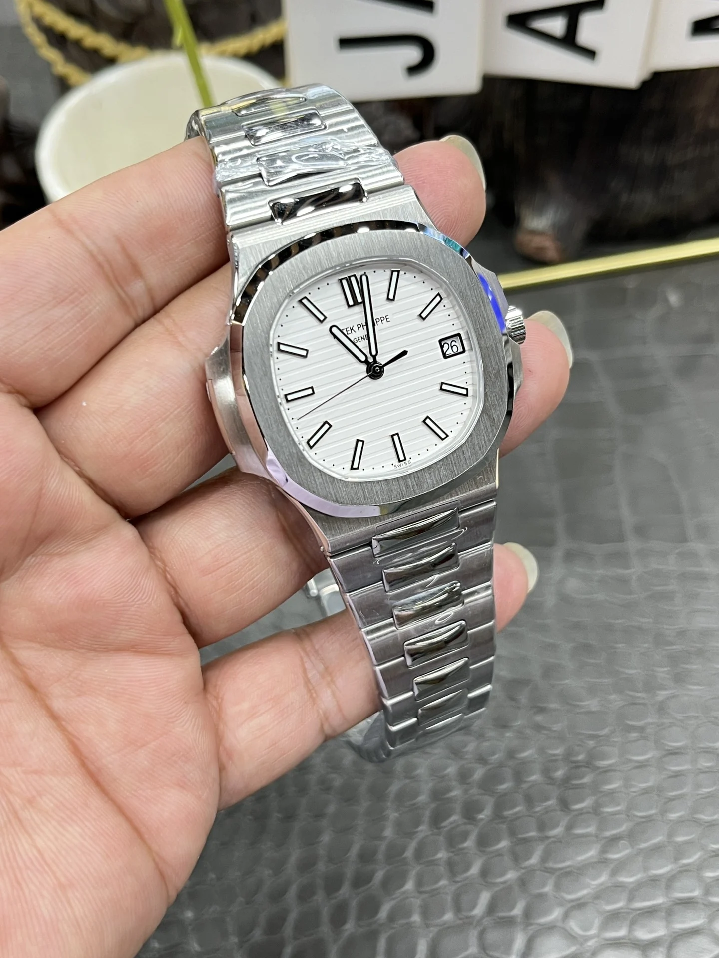 Patek Philippe Nautilus White Dial 5711 40mm — photographed off the sweep