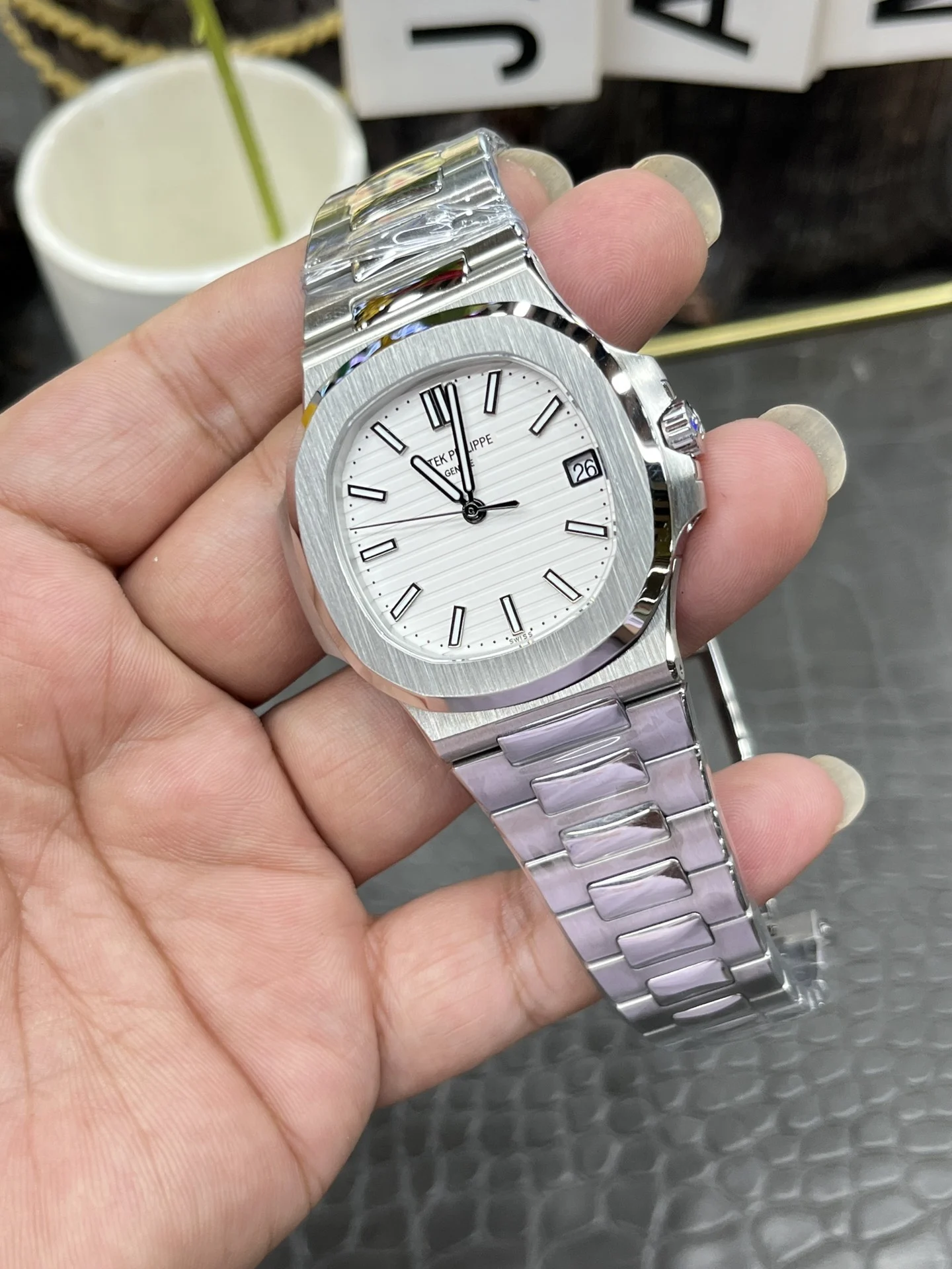 Patek Philippe Nautilus White Dial 5711 40mm — photographed off the sweep
