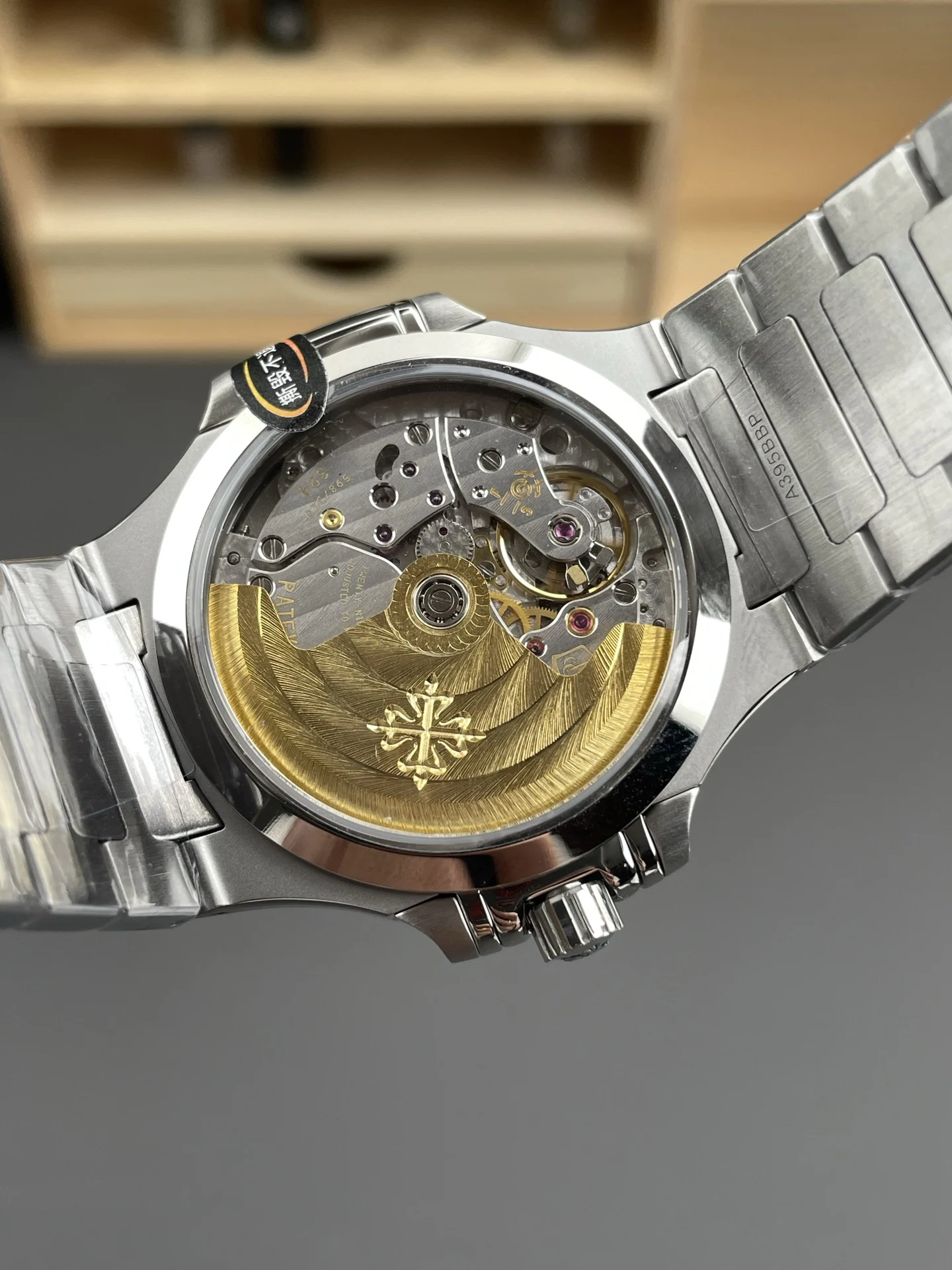 Patek Philippe Nautilus White Dial 7118 — photographed off the sweep