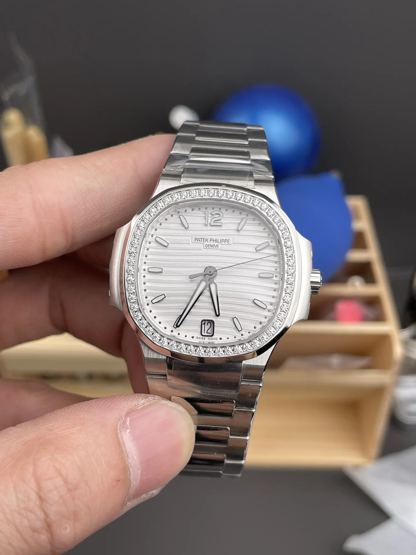 Patek Philippe Nautilus White Dial Diamond-Set 7118 — photographed off the sweep