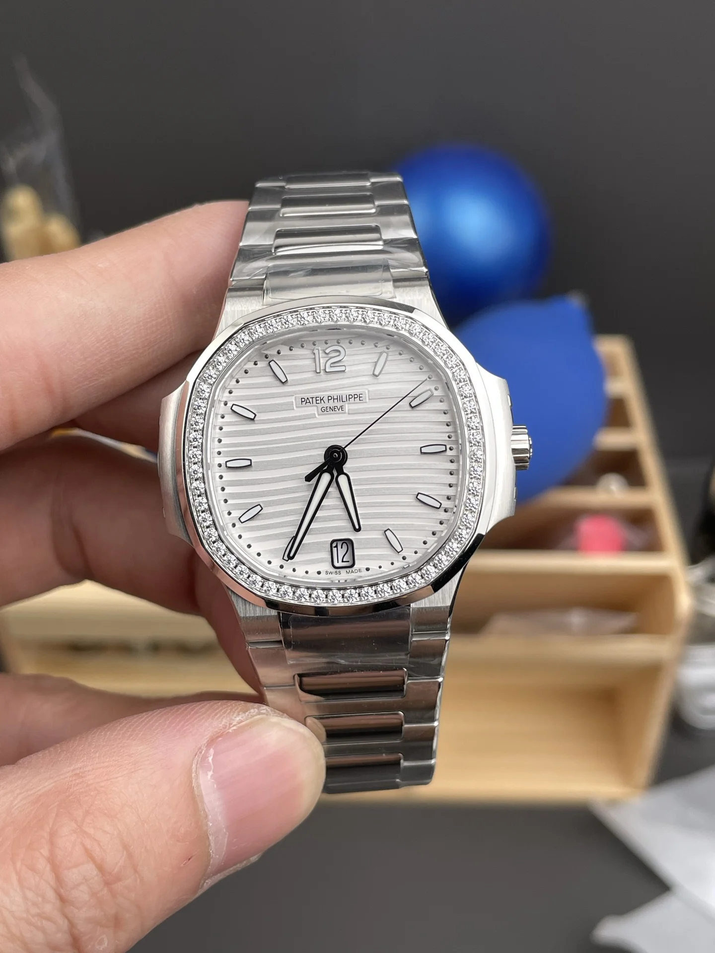 Patek Philippe Nautilus White Dial Diamond-Set 7118 — photographed off the sweep