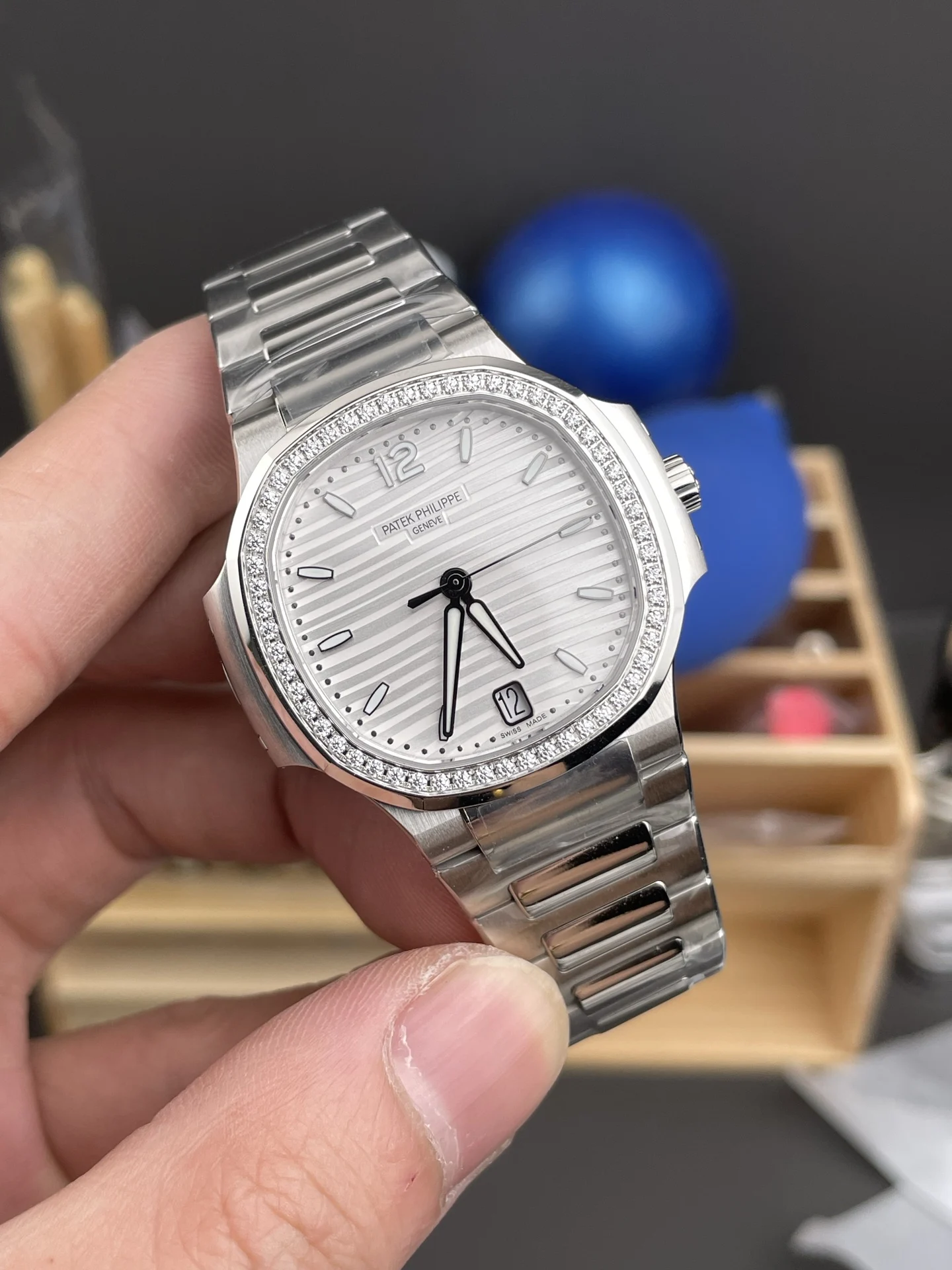 Patek Philippe Nautilus White Dial Diamond-Set 7118 — photographed off the sweep