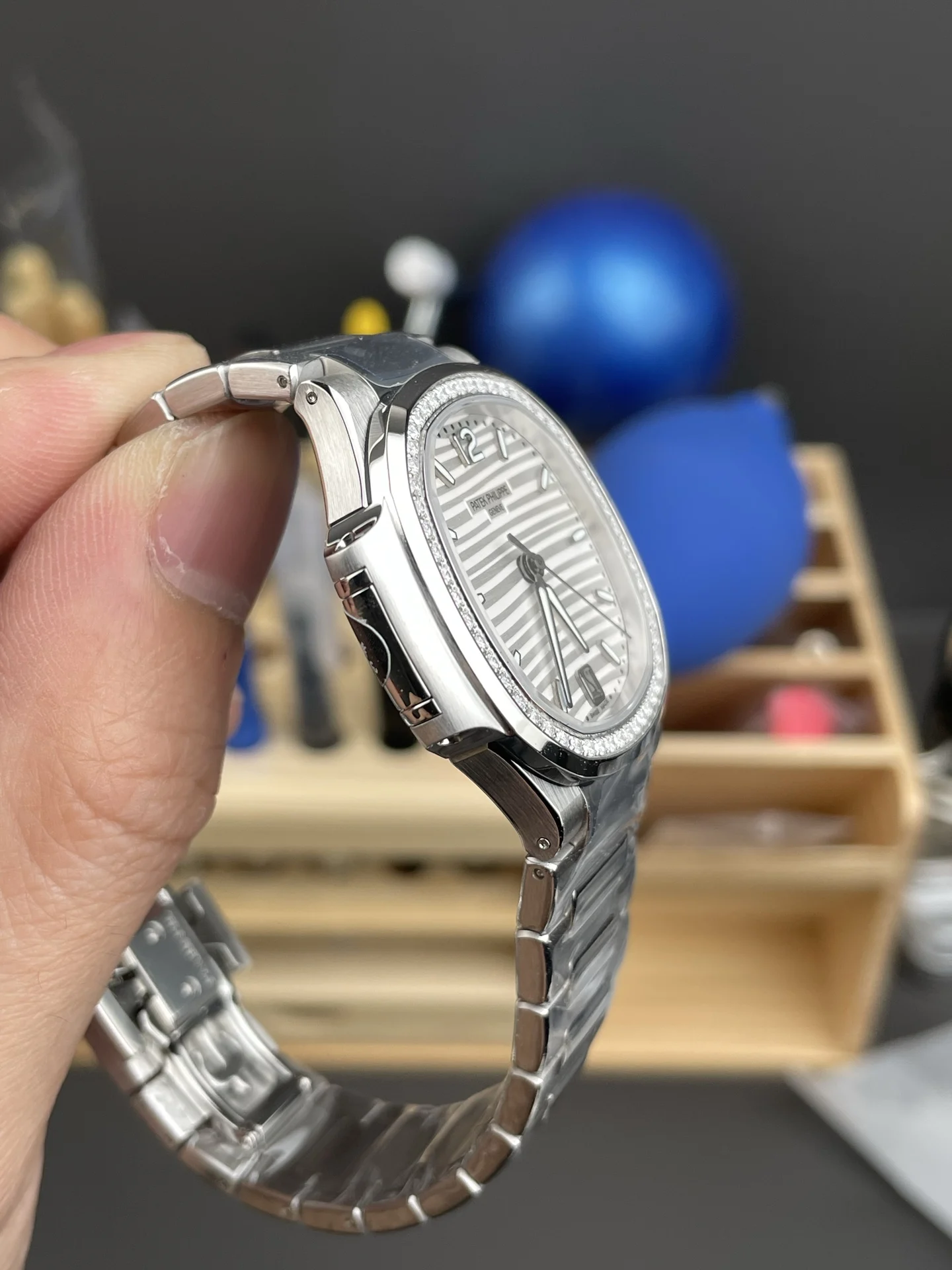 Patek Philippe Nautilus White Dial Diamond-Set 7118 — photographed off the sweep