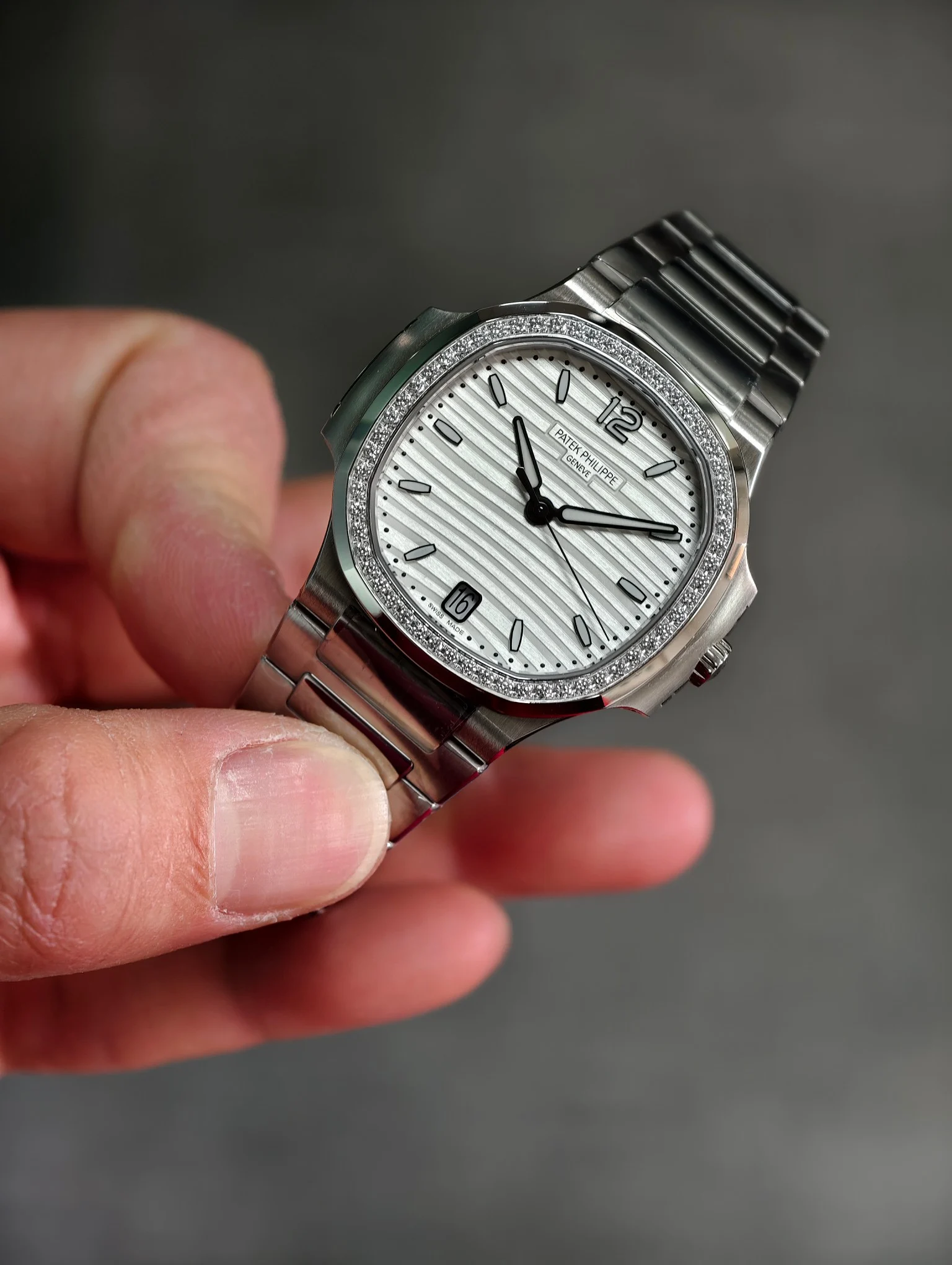 Patek Philippe Nautilus White Dial Diamond-Set — photographed off the sweep