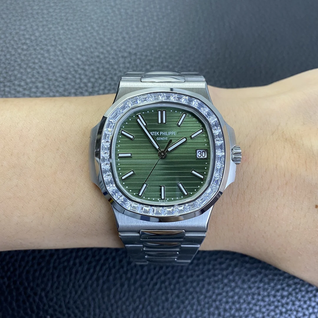 Patek Philippe Nautilus White Gold Green Dial 5711 — photographed off the sweep