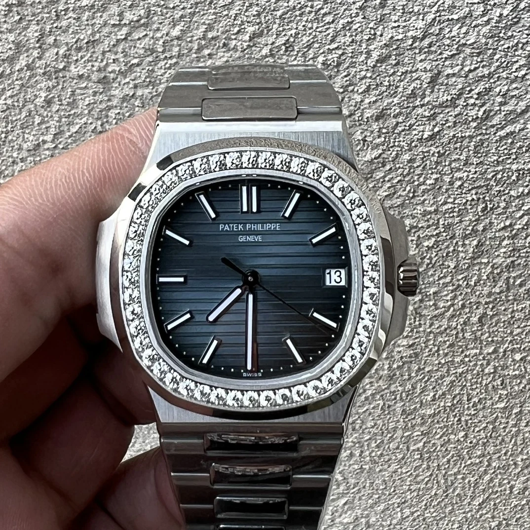 Patek Philippe Nautilus White Gold White Dial 5711 — photographed off the sweep