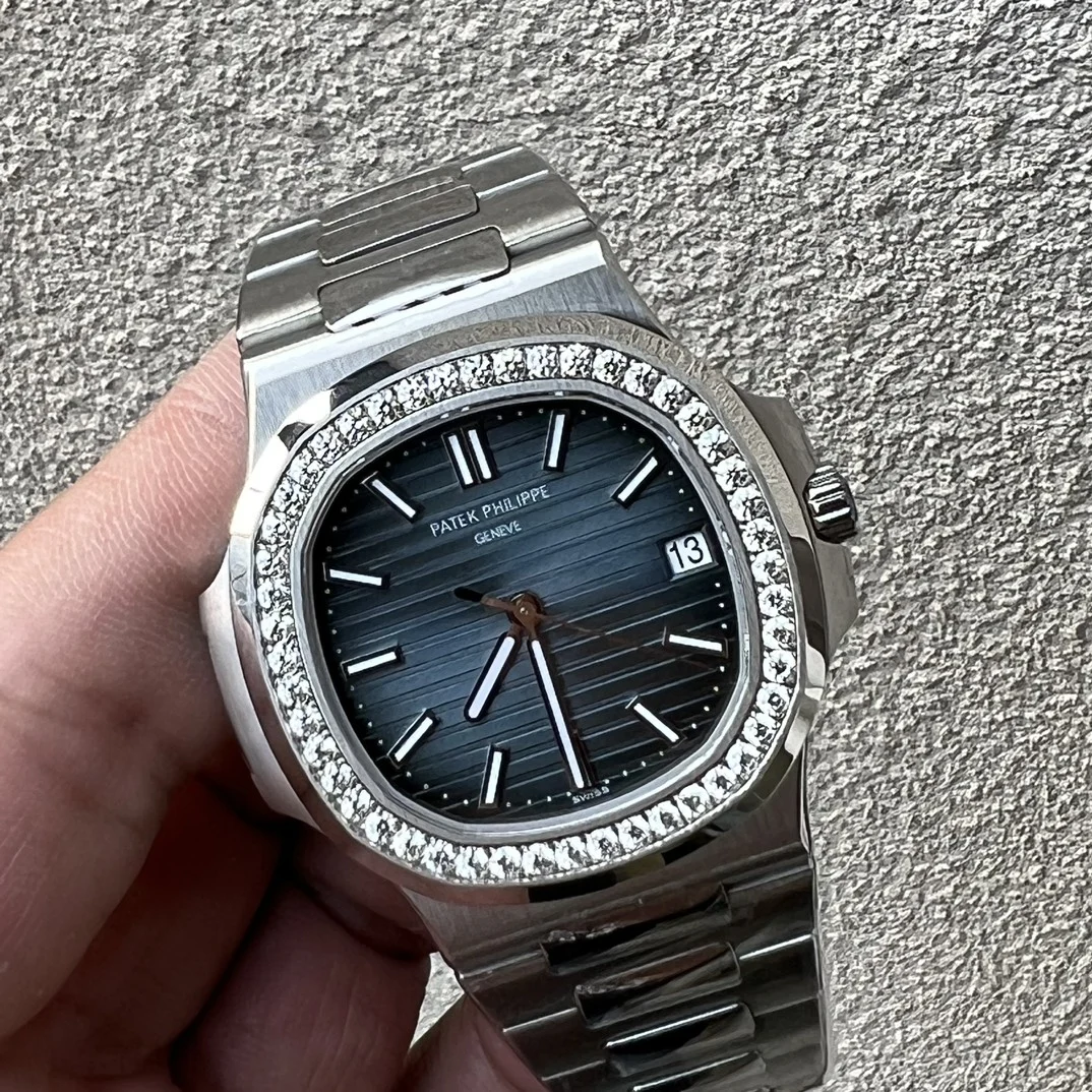 Patek Philippe Nautilus White Gold White Dial 5711 — photographed off the sweep