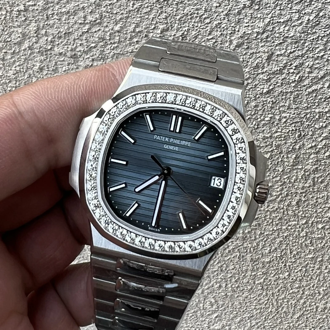 Patek Philippe Nautilus White Gold White Dial 5711 — photographed off the sweep