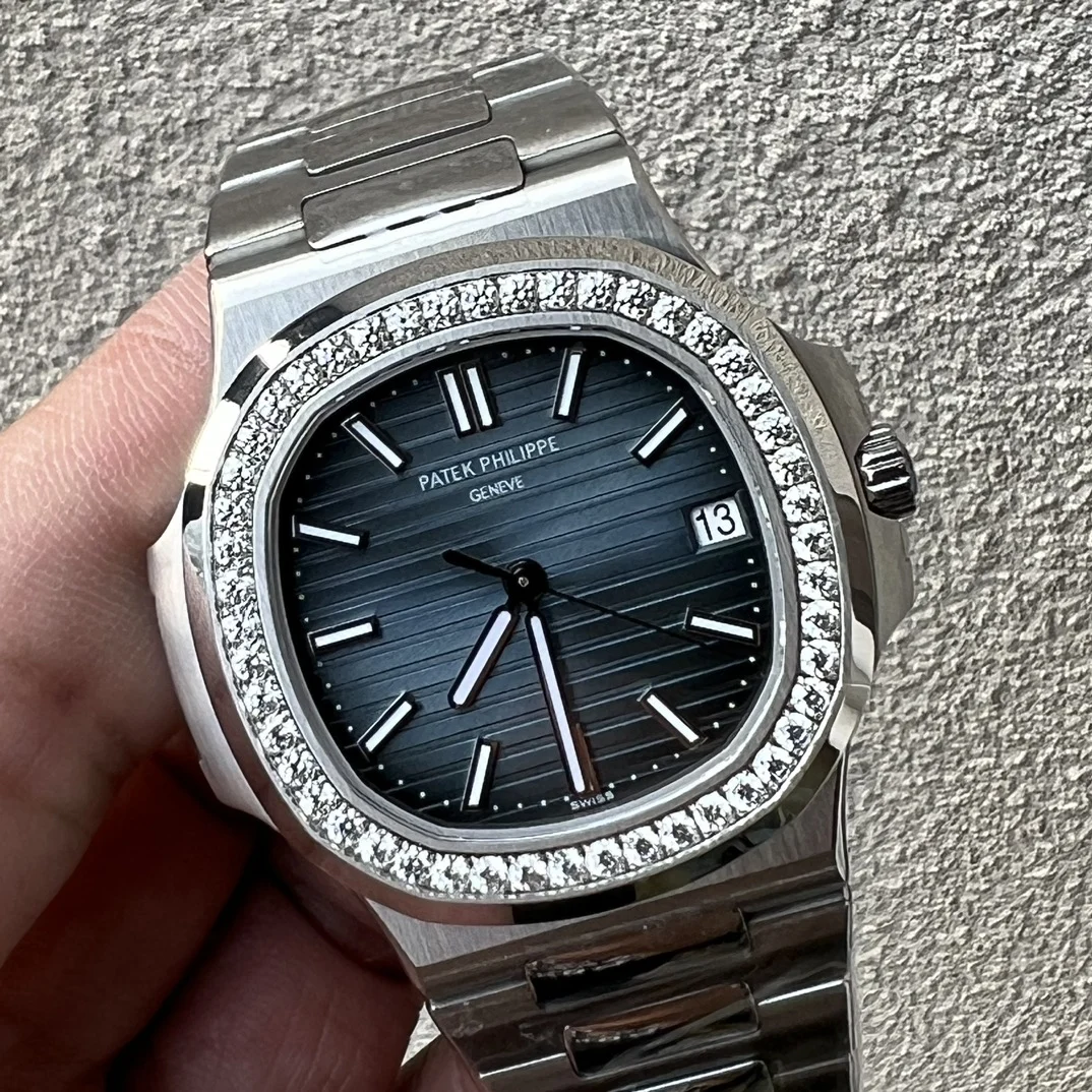 Patek Philippe Nautilus White Gold White Dial 5711 — photographed off the sweep
