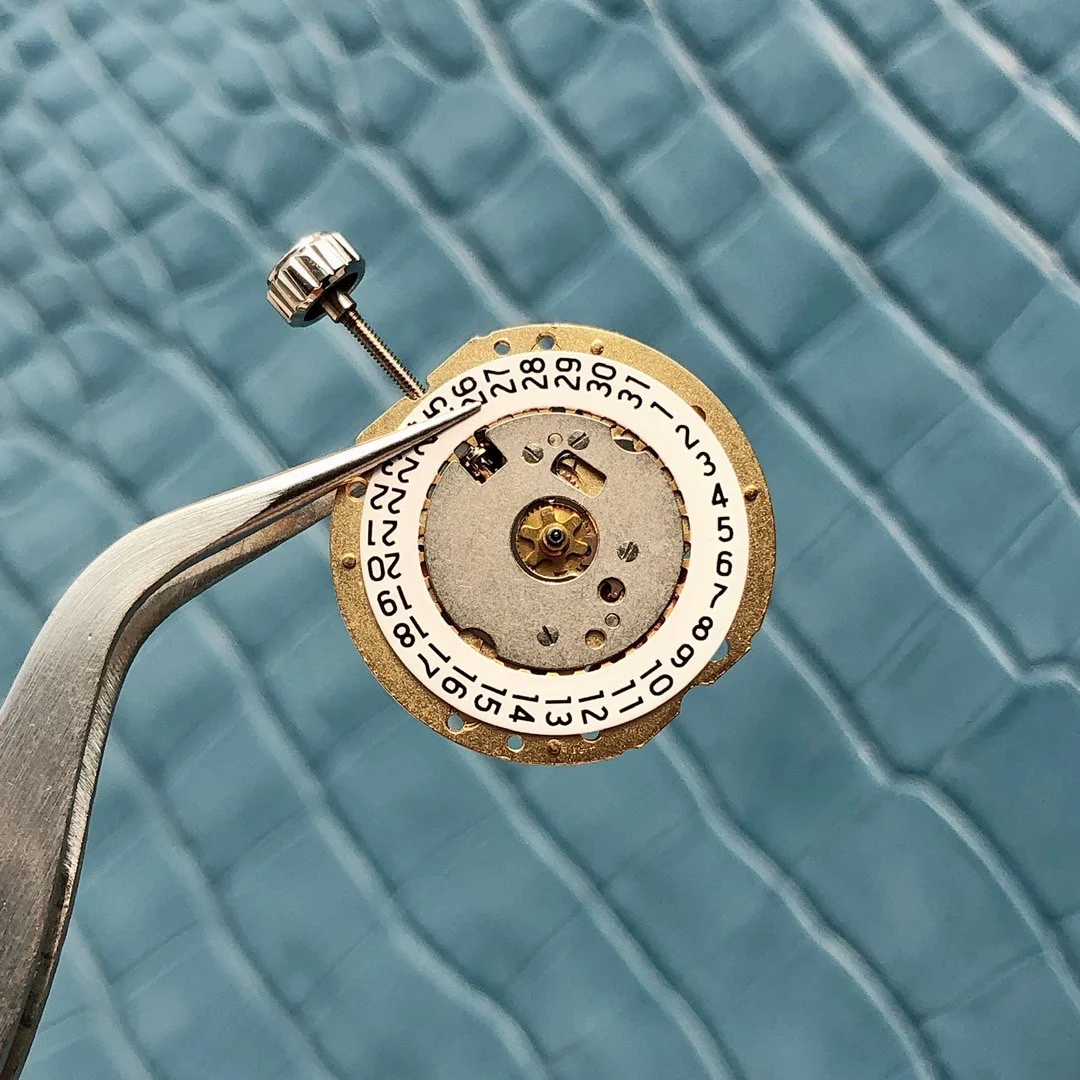 Professional disassembly to examine the parts and movement details — photographed off the sweep