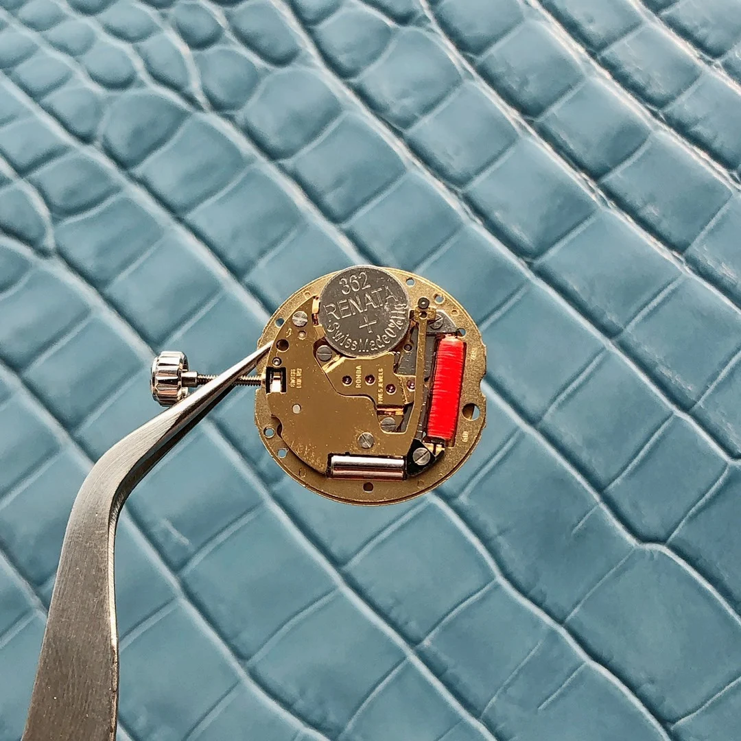 Professional disassembly to examine the parts and movement details — photographed off the sweep