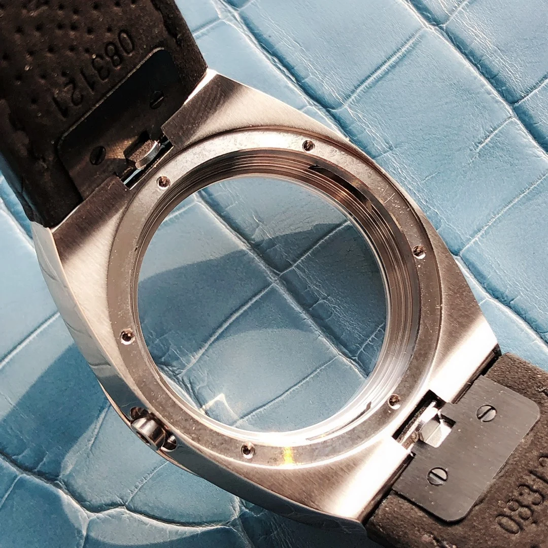 Professional disassembly to examine the parts and movement details — photographed off the sweep